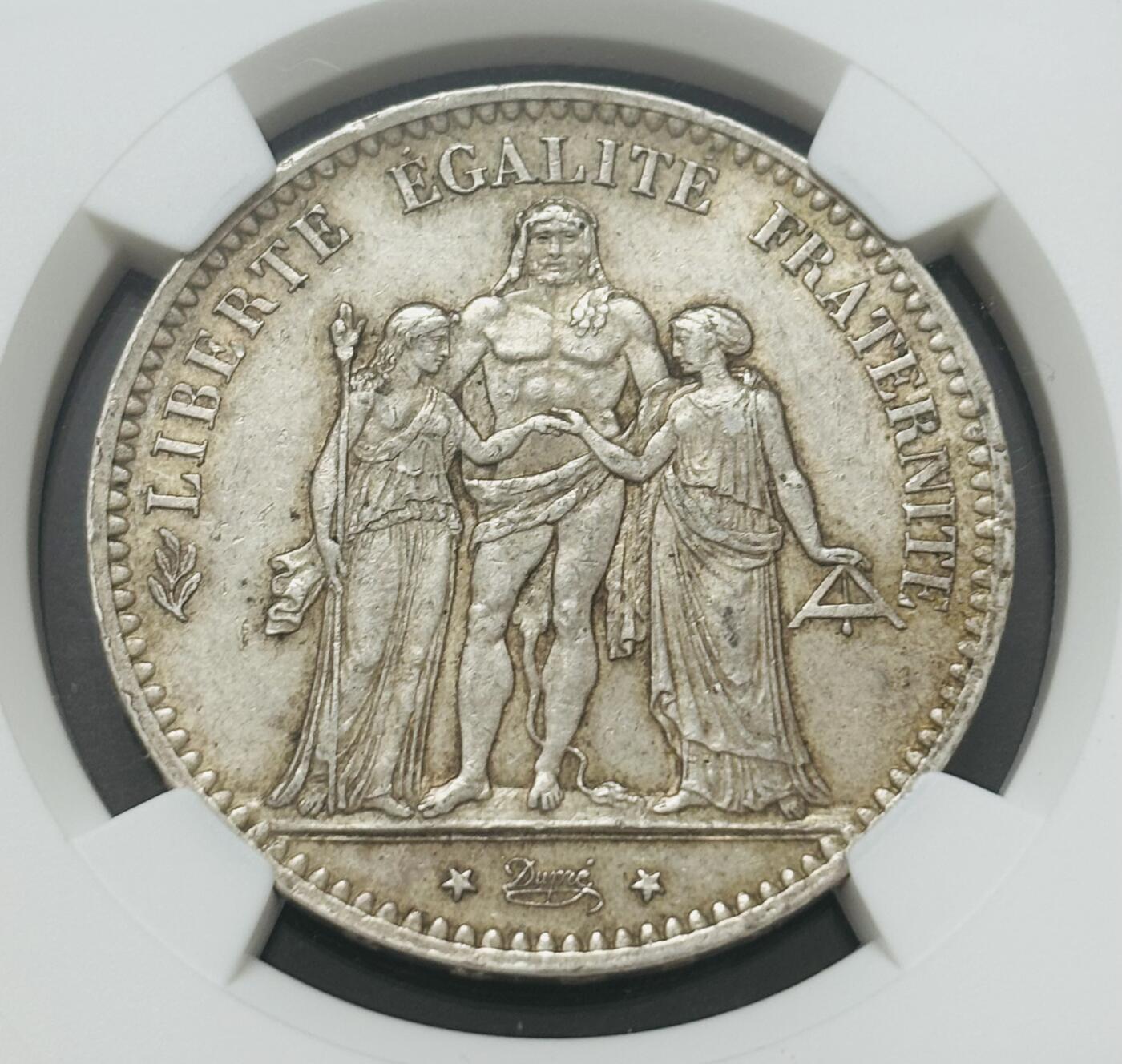 文馨钱币收藏第 283 场，【大雪鉴珍，寒英缀金】金银纪念币精品场，诚邀您的参与【长期接代拍品】 1876 年法兰西第三共和国大力神 5 法郎大银币 900 高银 A 版，NGC 评级 MS62 分，转光感强，细节不错