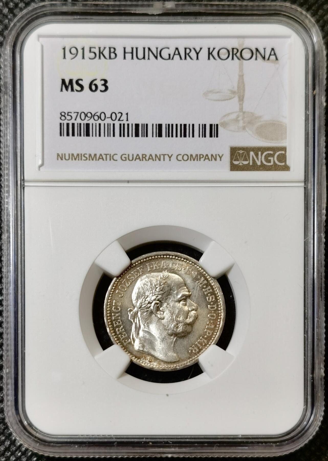 甄臻铺-世界币章拍卖（第40期）送拍享返佣金等优惠多多 NGC-MS63 奥匈帝国1915科罗娜银币，很少见的匈牙利版，正面环五彩包浆，背面镜面感非常强，状态满分的一枚，略有低评