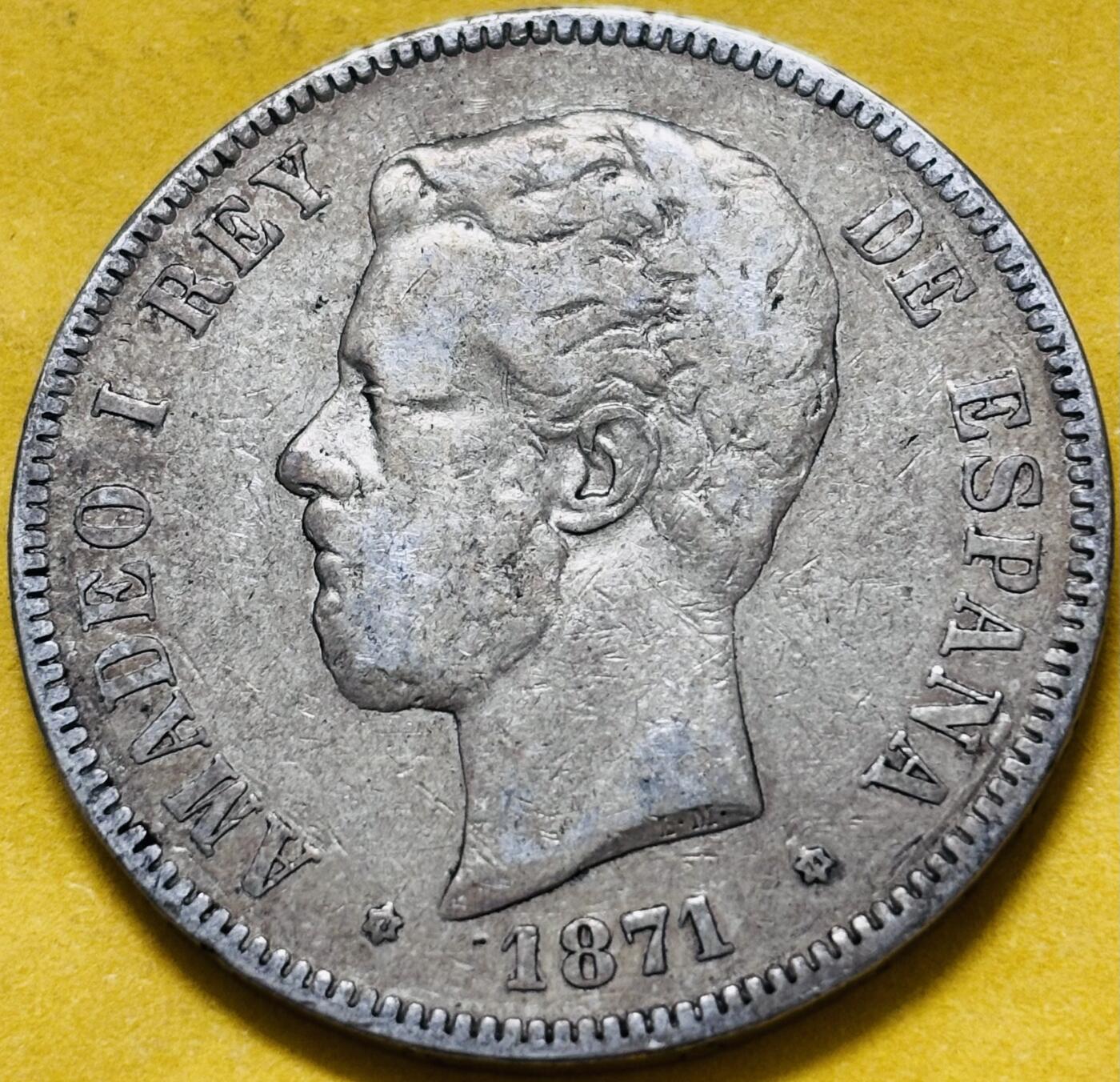 文馨钱币收藏第 283 场，【大雪鉴珍，寒英缀金】金银纪念币精品场，诚邀您的参与【长期接代拍品】 1871 年西班牙阿玛尼奥一世 5 比塞塔大银币 900 高银，首发年