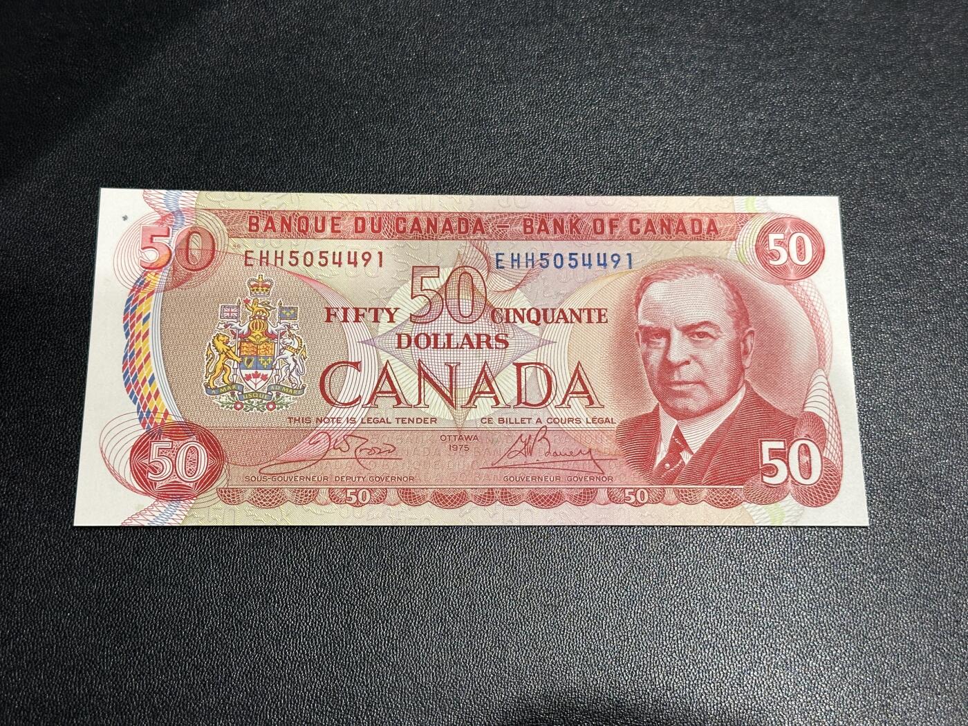 《外钞收藏家》第五百八十八期（优质场）（本平台长期征集拍品、欢迎藏友们联系合作） 加拿大1975年景观版系列50元（背面是经典皇家骑警）	UNC  有个斑瑕疵