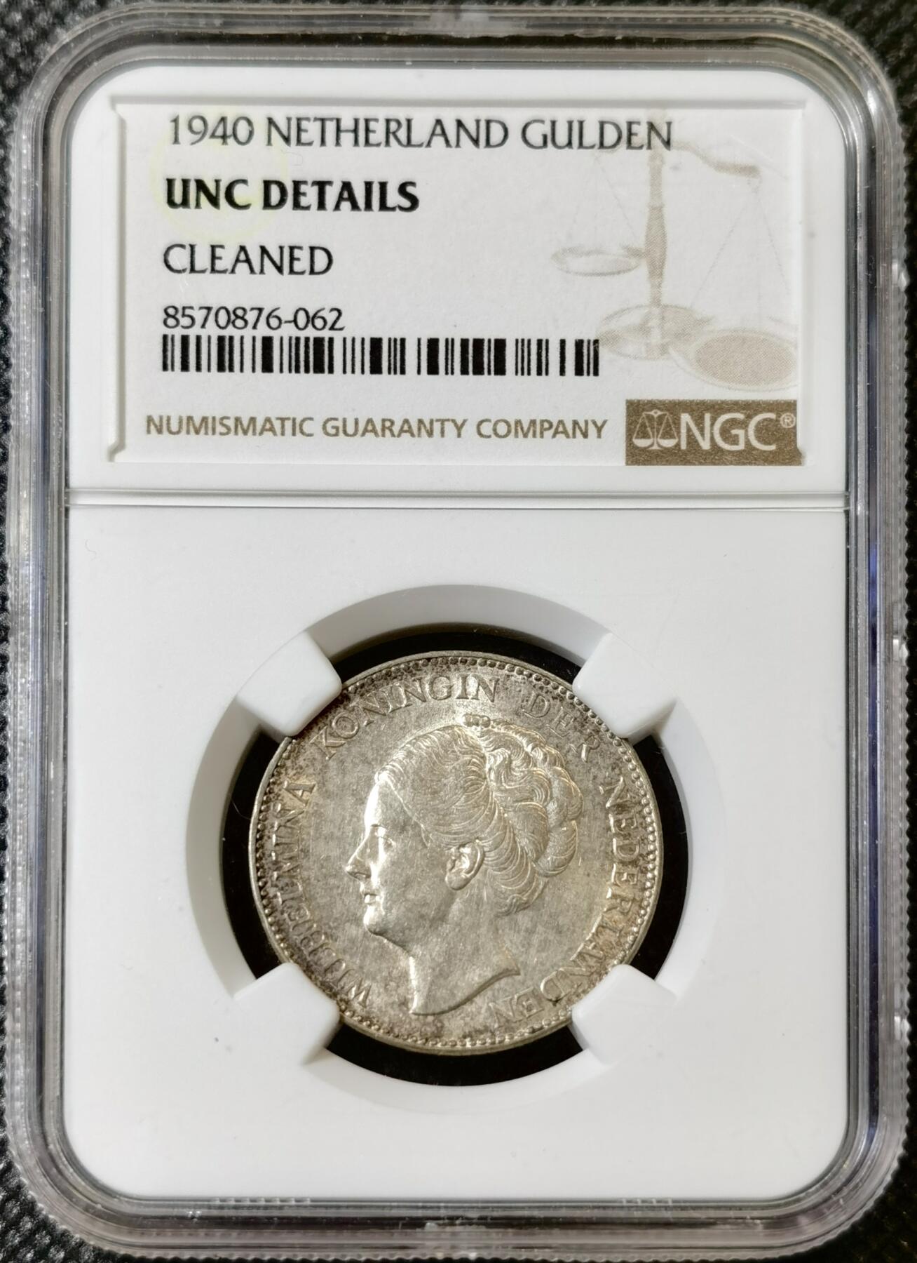 甄臻铺-世界币章拍卖（第40期）送拍享返佣金等优惠多多 NGC-UNCD 荷兰1940一盾银币，状态不错，看不出来清洗的痕迹，关币的银价就80多元