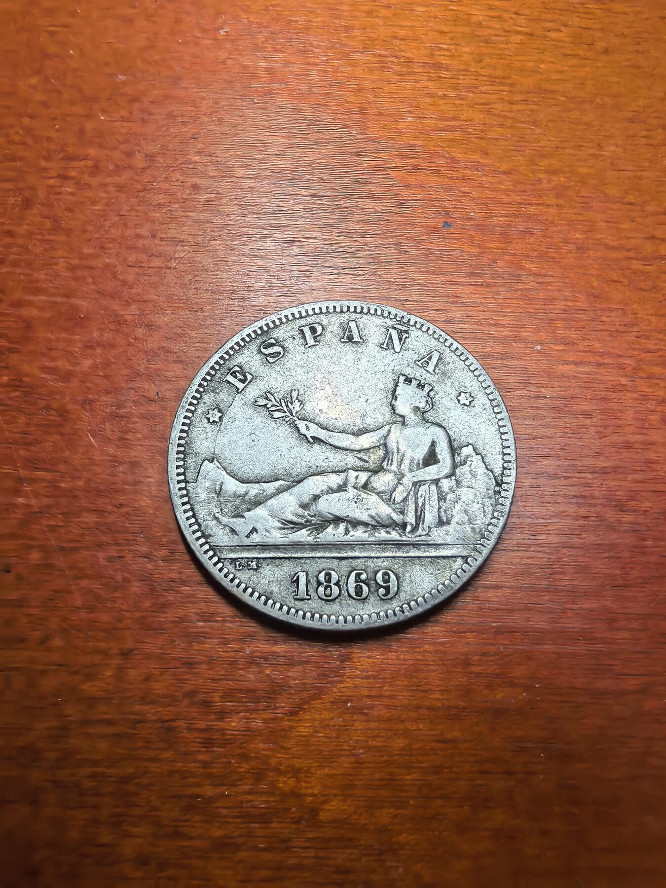 长老汇蛇年精选第七十九场拍卖 1869（69）西班牙拿花2比塞塔银币，10克835银，马德里造币厂，克书XF40分200美金