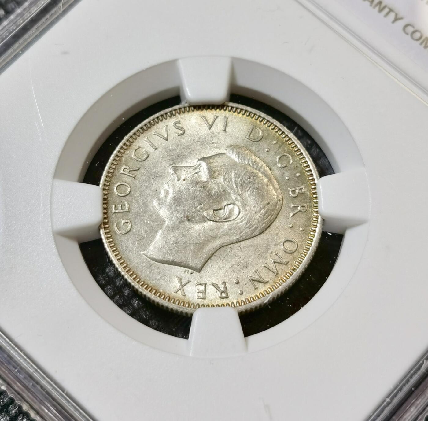 甄臻铺-世界币章拍卖（第40期）送拍享返佣金等优惠多多 NGC-MS63 英国1946乔治六世先令银币，英格兰版，五彩包浆，BU状态好