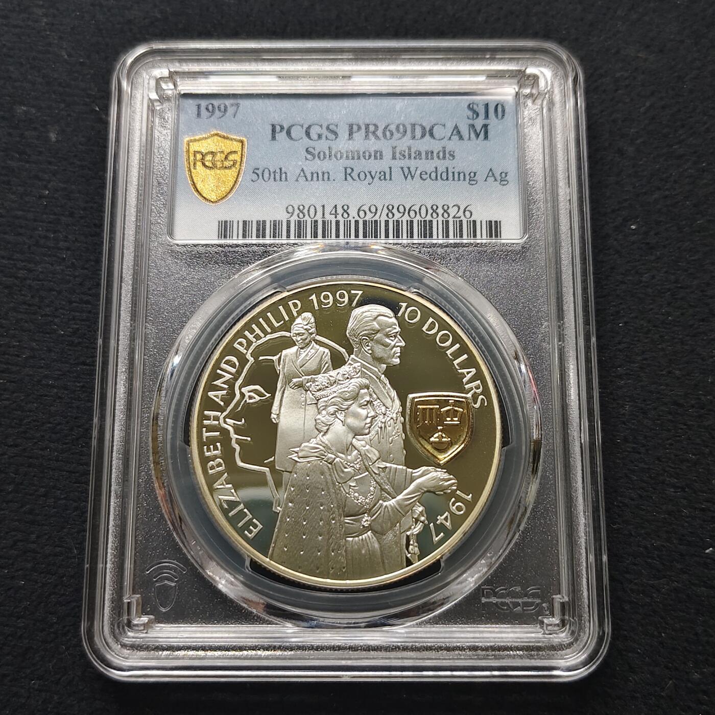 【全场包邮】纯粹捡漏拍481场（免费代拍第18场） 所罗门群岛1997年10元女王金婚局部镀金精制克朗型纪念银币-PCGS PR69 DCAM