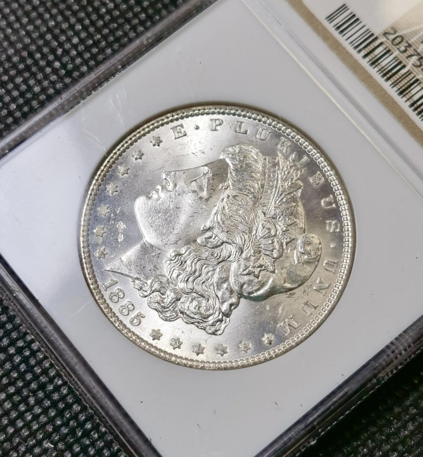 甄臻铺-世界币章拍卖（第40期）送拍享返佣金等优惠多多 NGC-MS64 1885年美国摩根，PL镜面质感，小白盒，手感很好