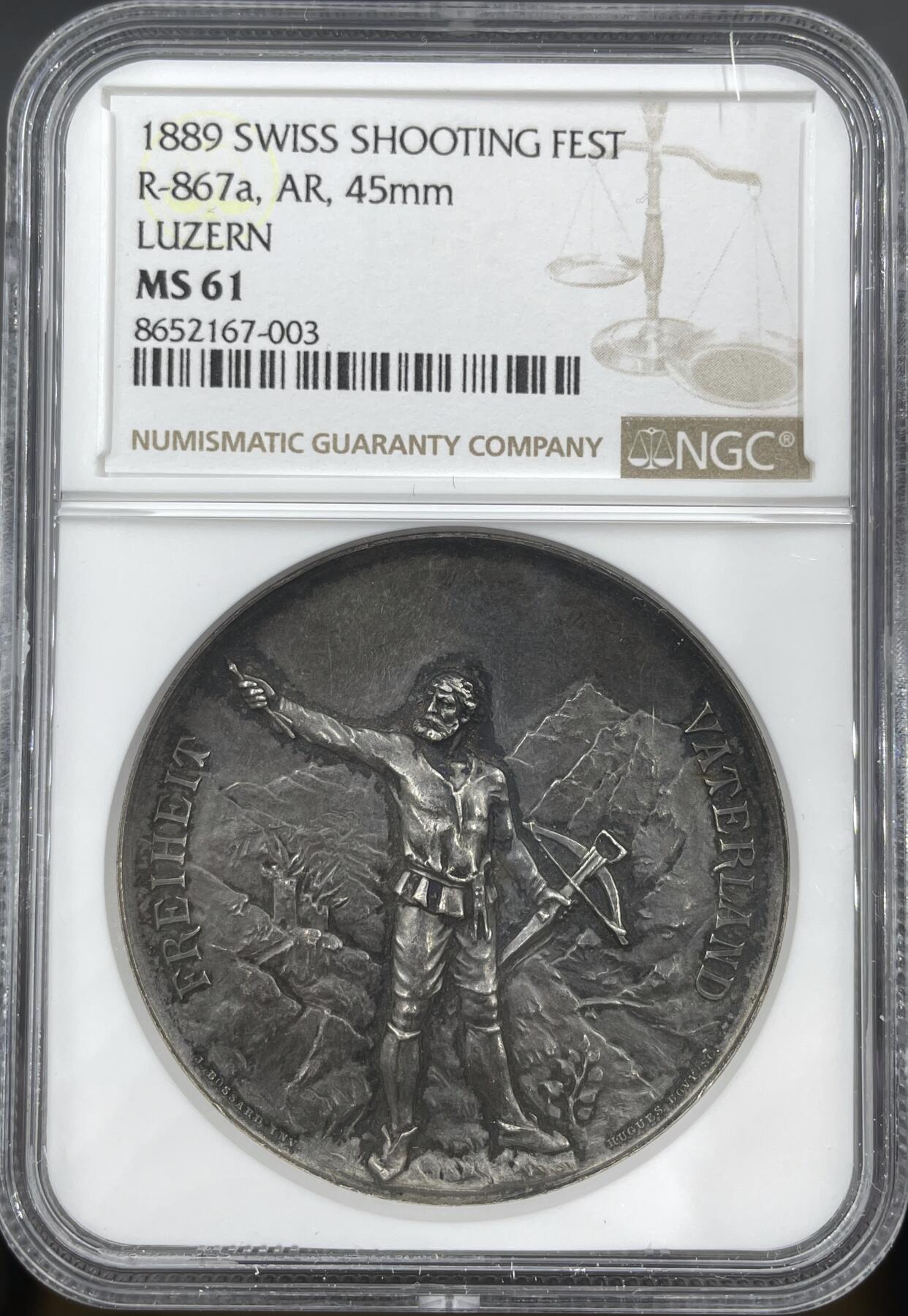 「木头集藏」章牌精品专场！ Bovy~1889年瑞士卢塞恩射击节银章， MS61 ，直径:45mm，NGC加厚盒，分数略低评。高浮雕非常精美，整个人物呼之欲出，特别是人物头部的雕刻，已经不是平面的浮雕了，而几乎是立体的圆雕，可以说是体现瑞士射击节章牌高超艺术水准和铸造工艺的代表作品。