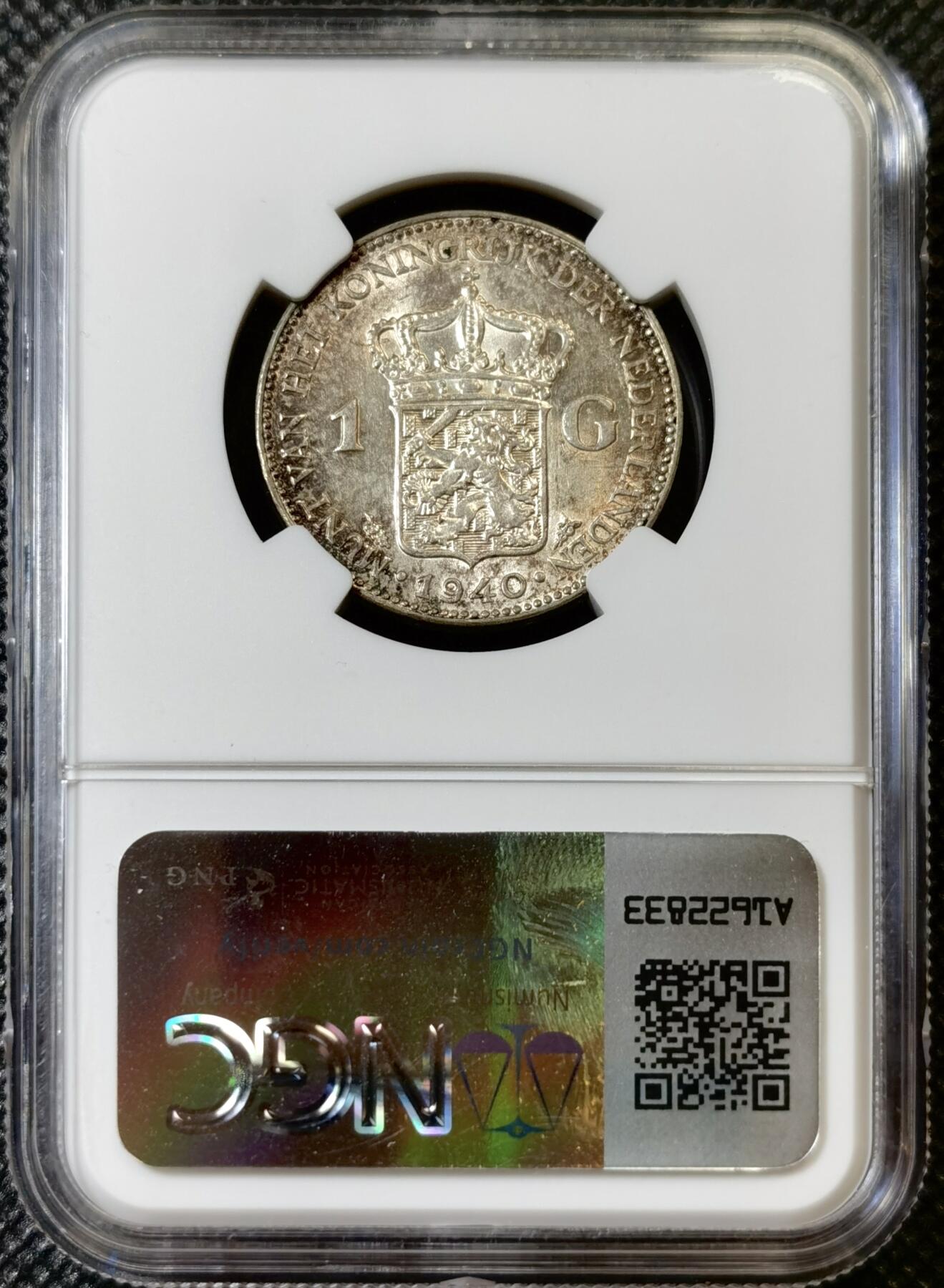 甄臻铺-世界币章拍卖（第40期）送拍享返佣金等优惠多多 NGC-UNCD 荷兰1940一盾银币，状态不错，看不出来清洗的痕迹，关币的银价就80多元