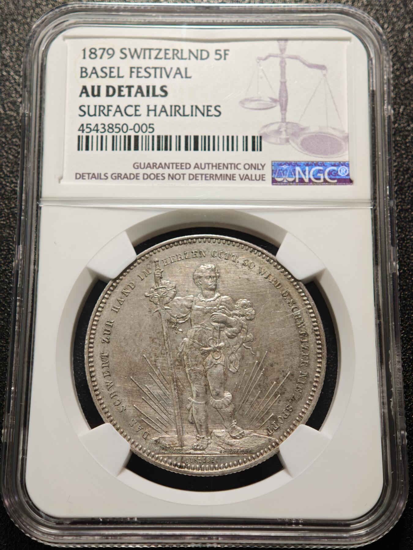【德藏】世界币章拍卖第155期（拍品征集中~欢迎藏友联系） 1879年 瑞士巴塞尔射击节5法郎纪念银币 NGC AU 正面是手持长剑的士兵形象 背面是瑞士联邦徽章和鹰头图案 铸造精美 淡淡包浆 品相完好
