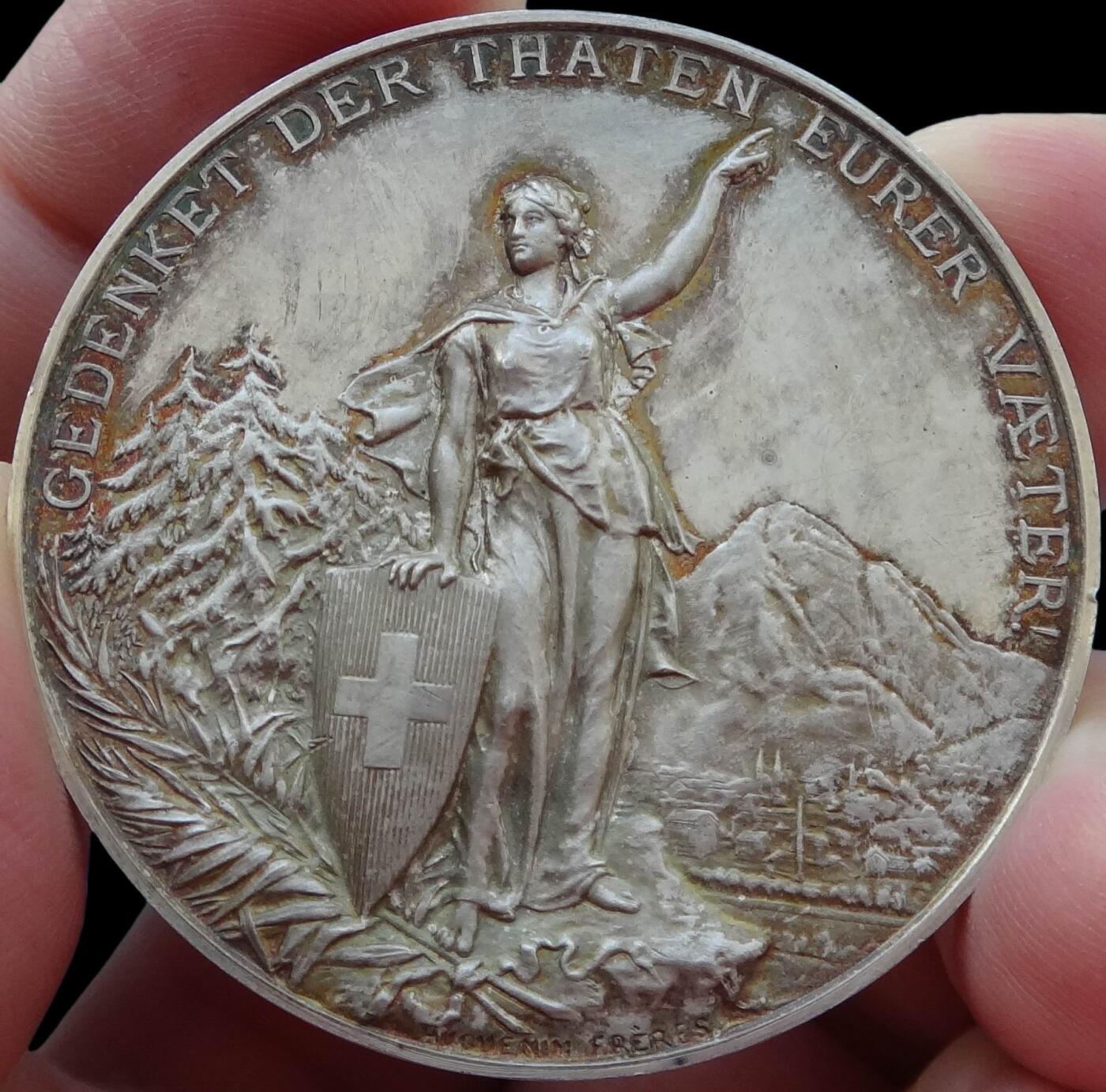 「木头集藏」章牌精品专场！ Huguenin～1892瑞士格拉鲁斯射击节银章，MS63 ，直径：45mm，38 g，NGC加厚盒，经典射击节品种，设计精美，包浆很漂亮。