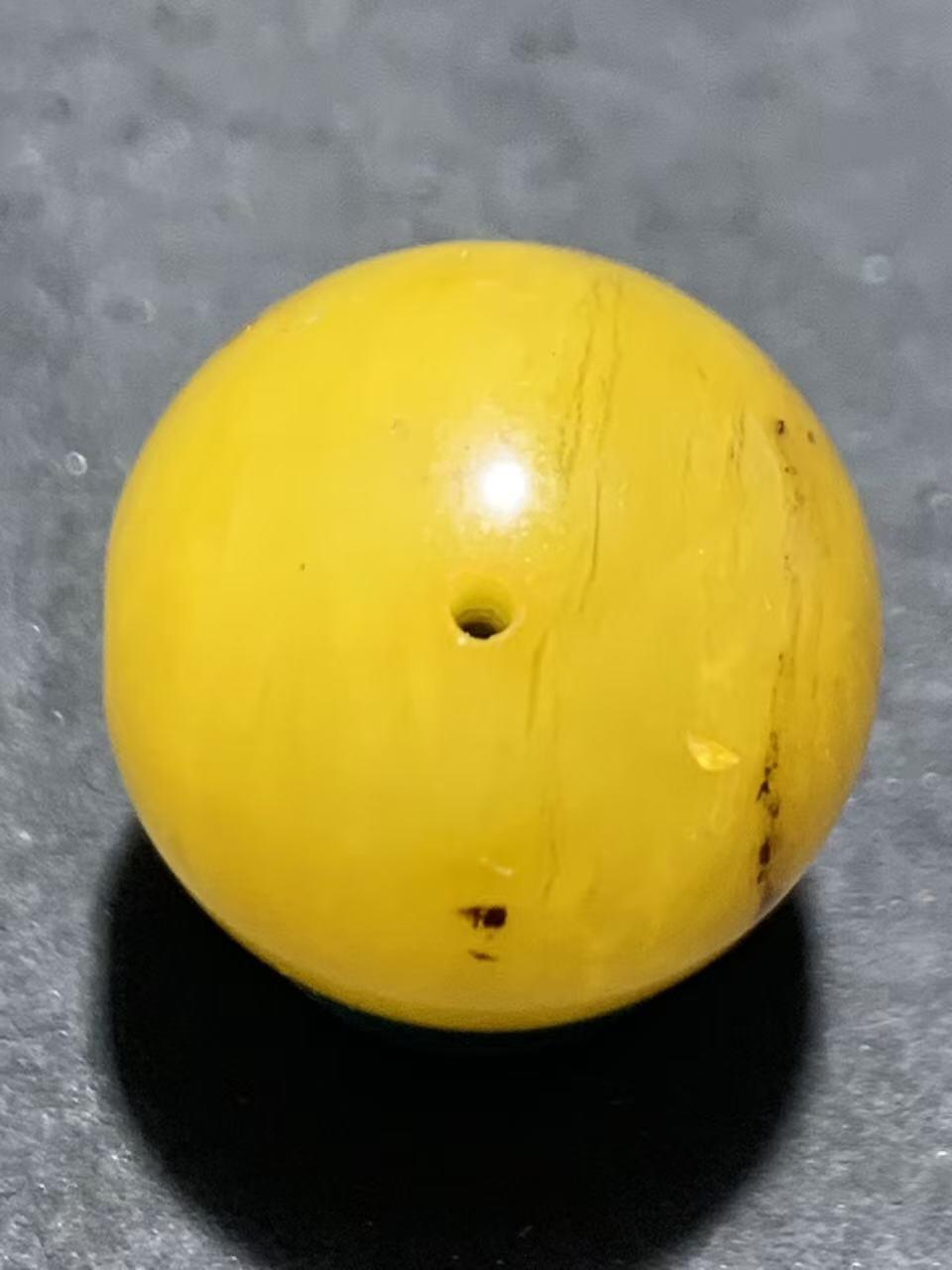 天然乌克兰蜜蜡通货圆珠一颗