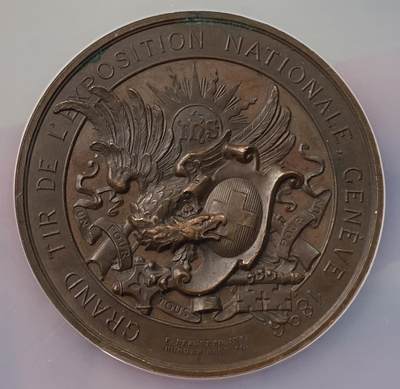 万国钱币拍卖第056期 - NGC MS61 1896年瑞士日内瓦联邦射击节纪念大铜章 最经典的锁子甲少女射击节 大规格高浮雕典藏品