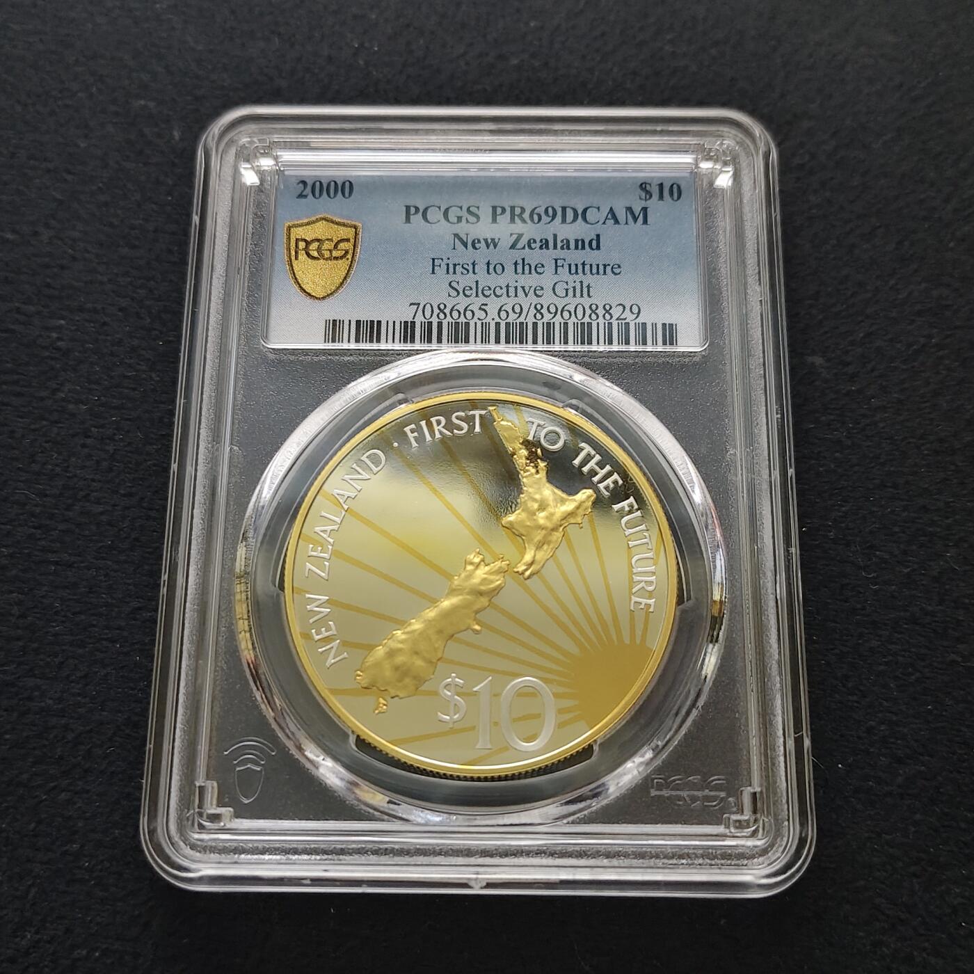 【全场包邮】纯粹捡漏拍481场（免费代拍第18场） 新西兰2000年10元千禧年太阳照耀新西兰局部镀金精制克朗型纪念银币-PCGS PR69 DCAM