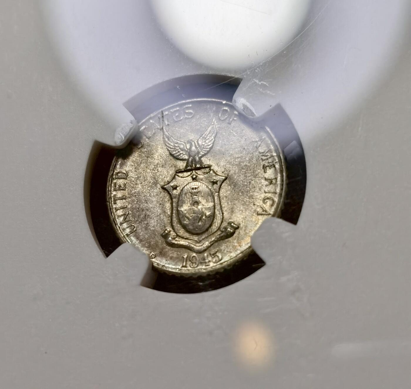 甄臻铺-世界币章拍卖（第40期）送拍享返佣金等优惠多多 NGC-MS64 美属菲律宾1945年10分银币，包浆好状态，漂亮的美品