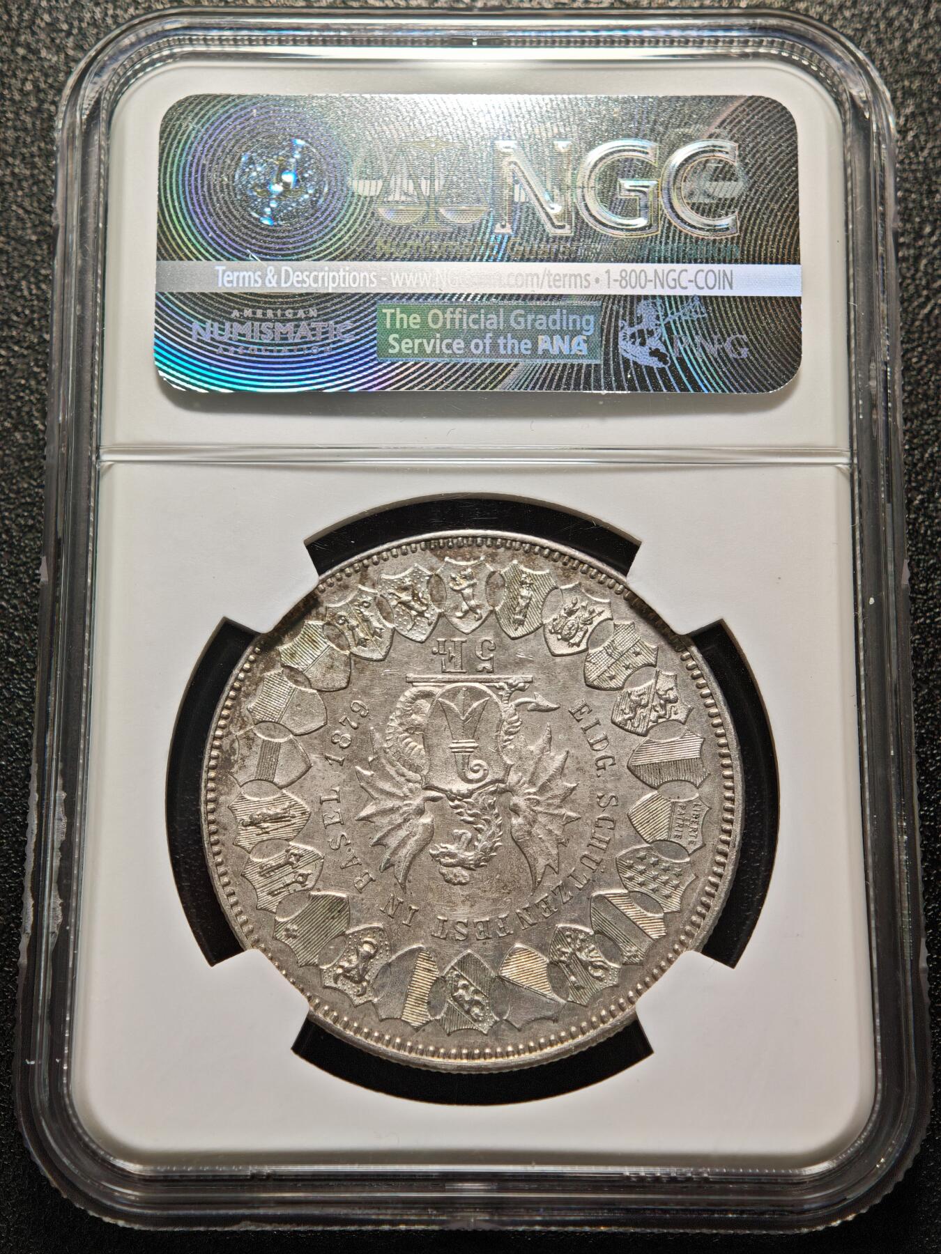 【德藏】世界币章拍卖第155期（拍品征集中~欢迎藏友联系） 1879年 瑞士巴塞尔射击节5法郎纪念银币 NGC AU 正面是手持长剑的士兵形象 背面是瑞士联邦徽章和鹰头图案 铸造精美 淡淡包浆 品相完好