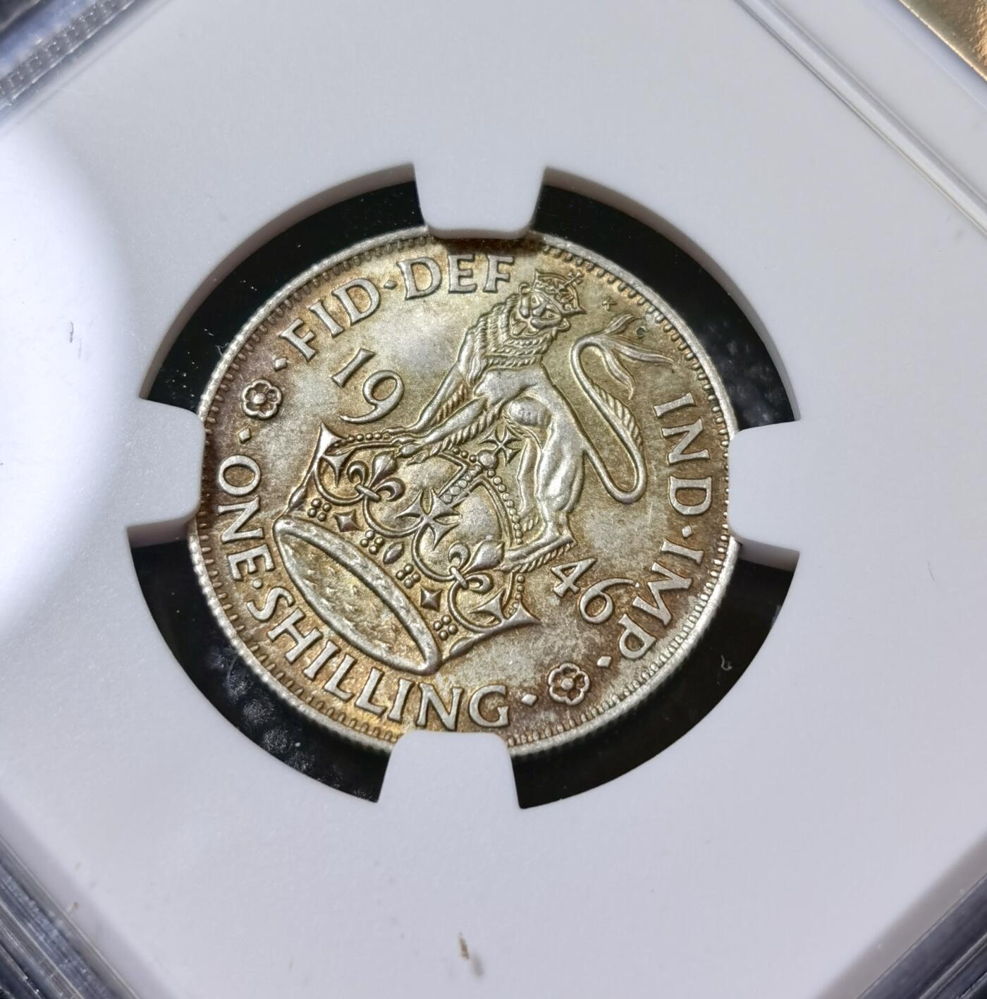 甄臻铺-世界币章拍卖（第40期）送拍享返佣金等优惠多多 NGC-MS63 英国1946乔治六世先令银币，英格兰版，五彩包浆，BU状态好
