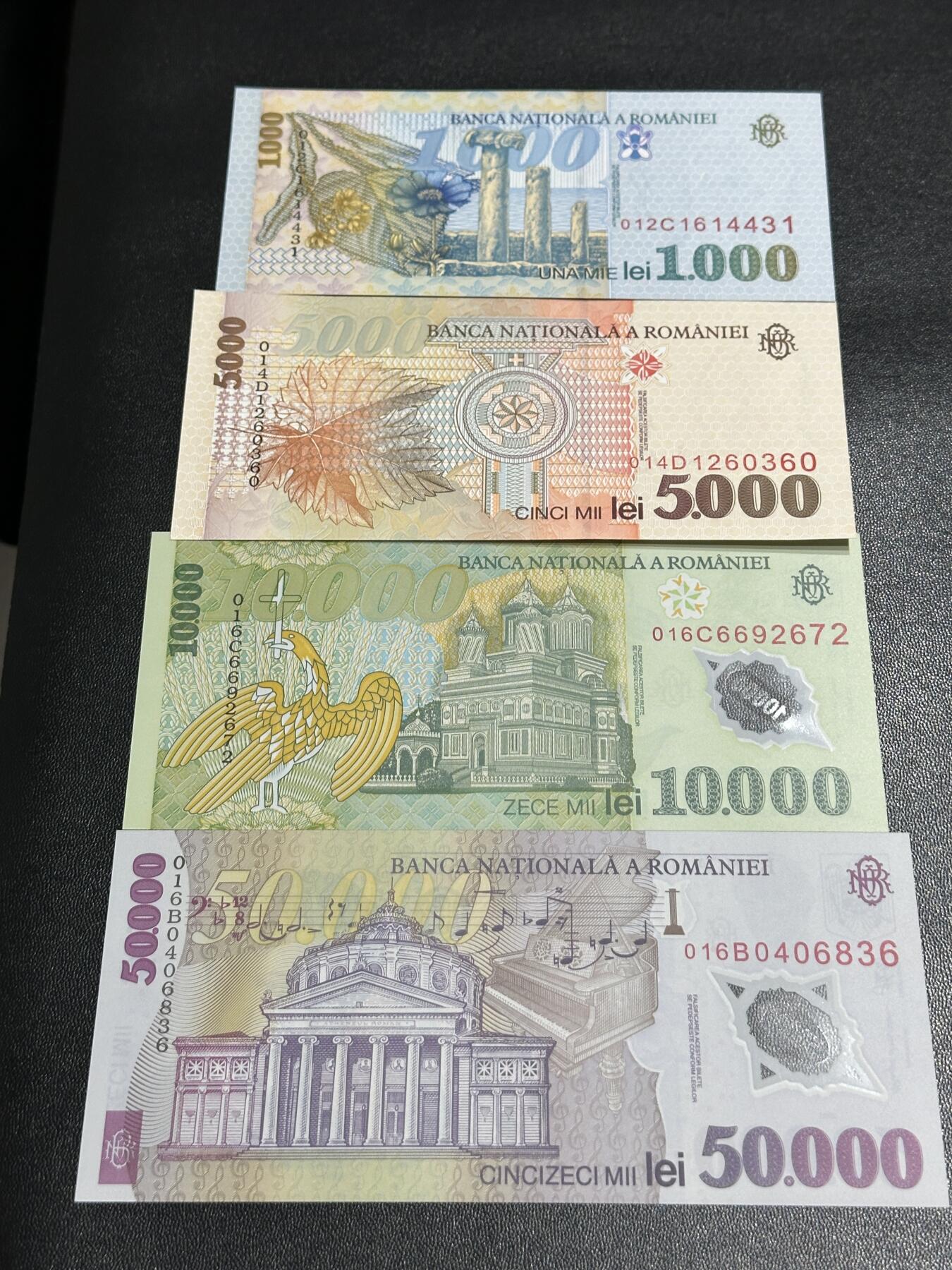 《外钞收藏家》第五百八十八期（优质场）（本平台长期征集拍品、欢迎藏友们联系合作） 罗马尼亚1998-2001年1000/5000纸钞+1万/5万塑料钞列伊4张老版大面额	UNC