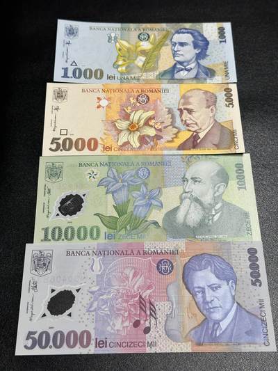 《外钞收藏家》第五百八十八期（优质场）（本平台长期征集拍品、欢迎藏友们联系合作） - 罗马尼亚1998-2001年1000/5000纸钞+1万/5万塑料钞列伊4张老版大面额	UNC