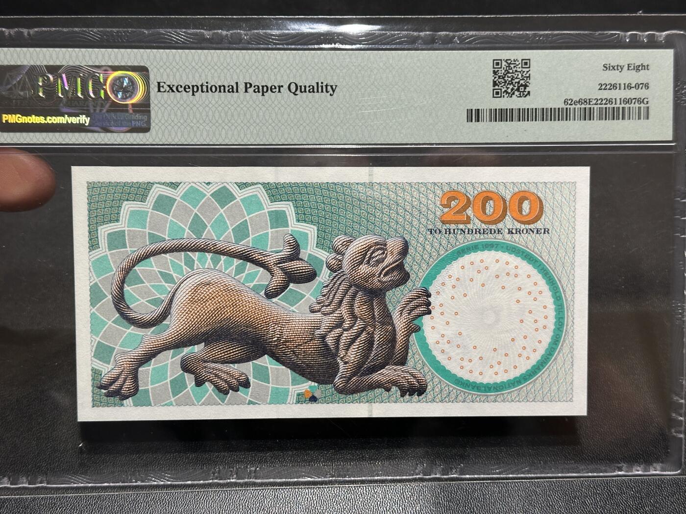 《外钞收藏家》第五百八十八期（优质场）（本平台长期征集拍品、欢迎藏友们联系合作） 丹麦2007年浮雕版200克朗PMG68（女歌剧家海博格）