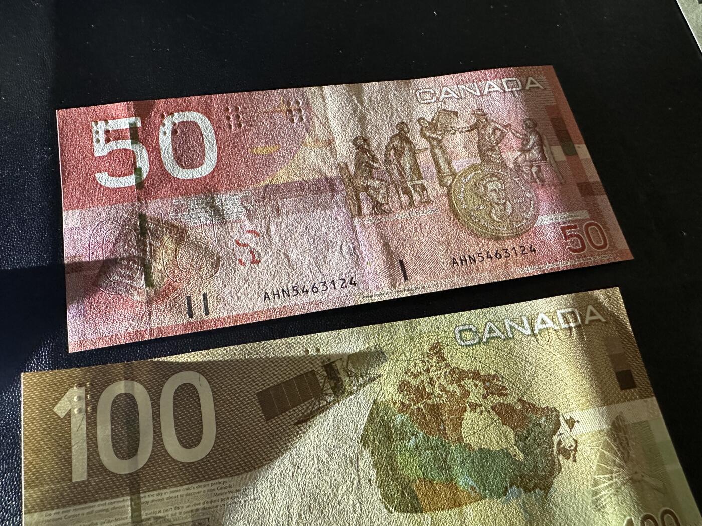 《外钞收藏家》第五百八十八期（优质场）（本平台长期征集拍品、欢迎藏友们联系合作） 加拿大之旅系列50/100元一对（50元UNC-，100元裸钞绝品）	UNC