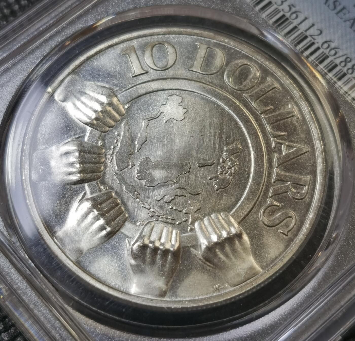 甄臻铺-世界币章拍卖（第40期）送拍享返佣金等优惠多多 PCGS-MS66 新加坡1977年10元精制银币 31克 纪念东盟成立10周年