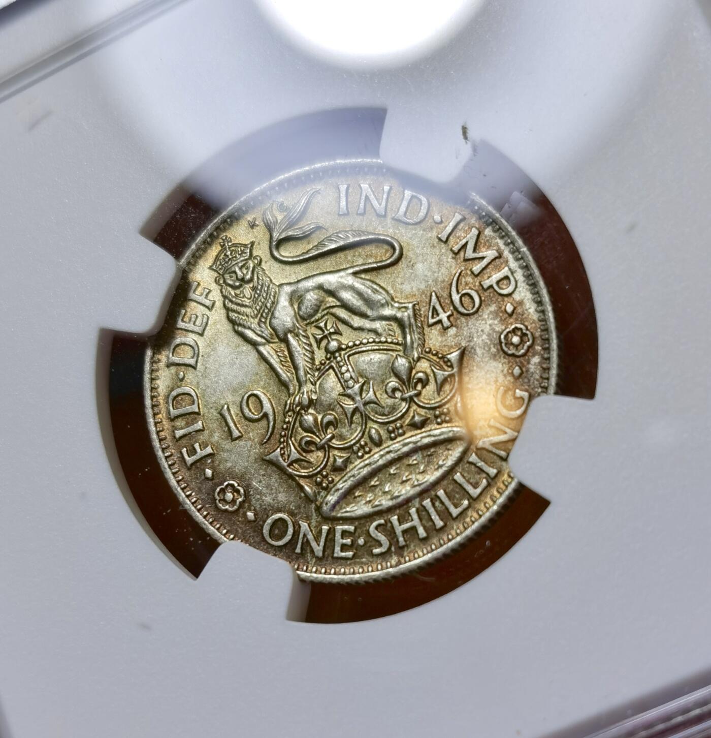 甄臻铺-世界币章拍卖（第40期）送拍享返佣金等优惠多多 NGC-MS63 英国1946乔治六世先令银币，英格兰版，五彩包浆，BU状态好