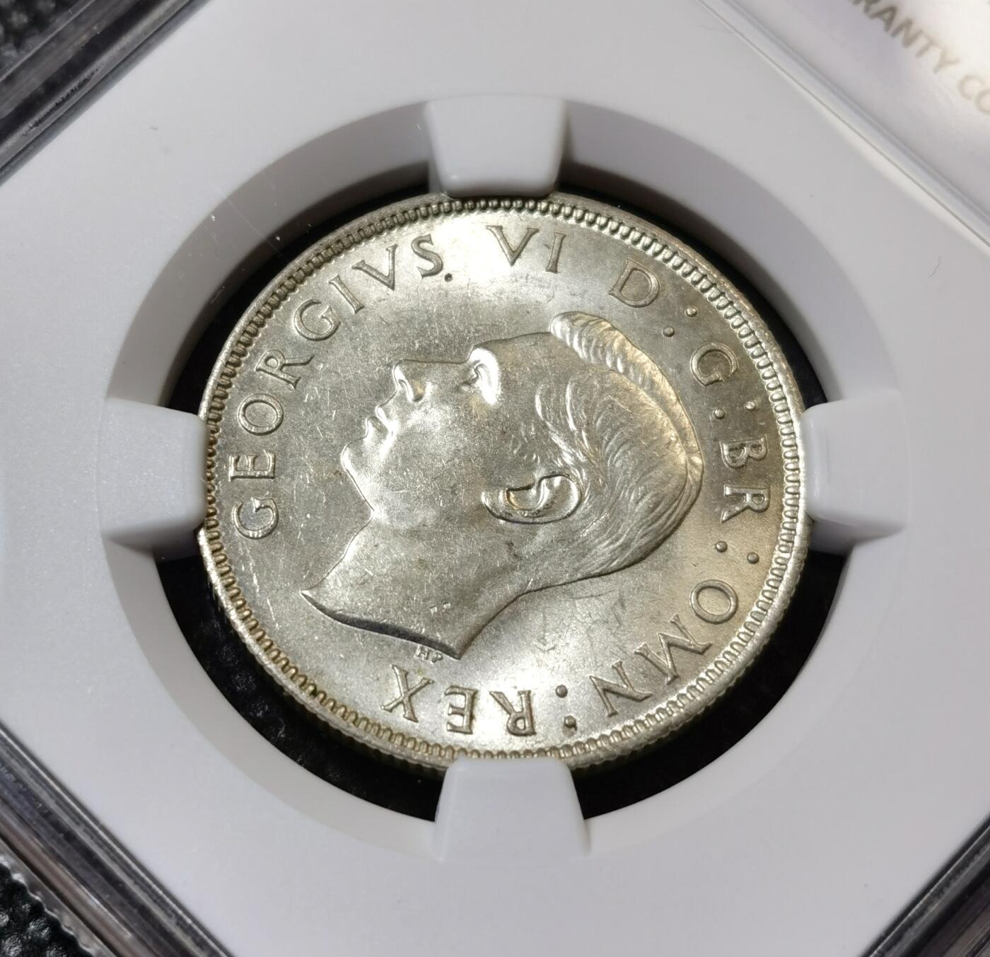 甄臻铺-世界币章拍卖（第40期）送拍享返佣金等优惠多多 NGC-MS62 英国1943年乔治六世弗洛林银币，原色银光，63-64状态，遇上低评了