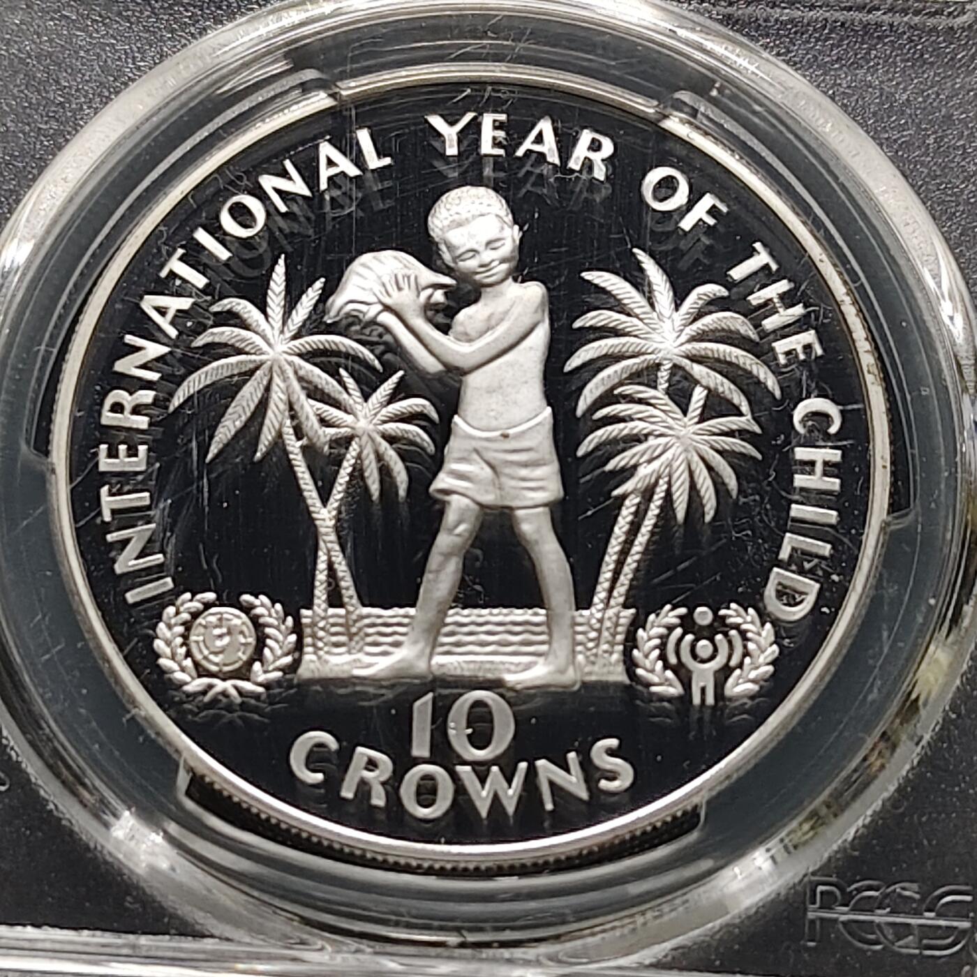 【全场包邮】纯粹捡漏拍481场（免费代拍第18场） 【少见】特克斯和凯克斯群岛1982年10克朗国际儿童年精制纪念银币-量7928-PCGS PR69 DCAM