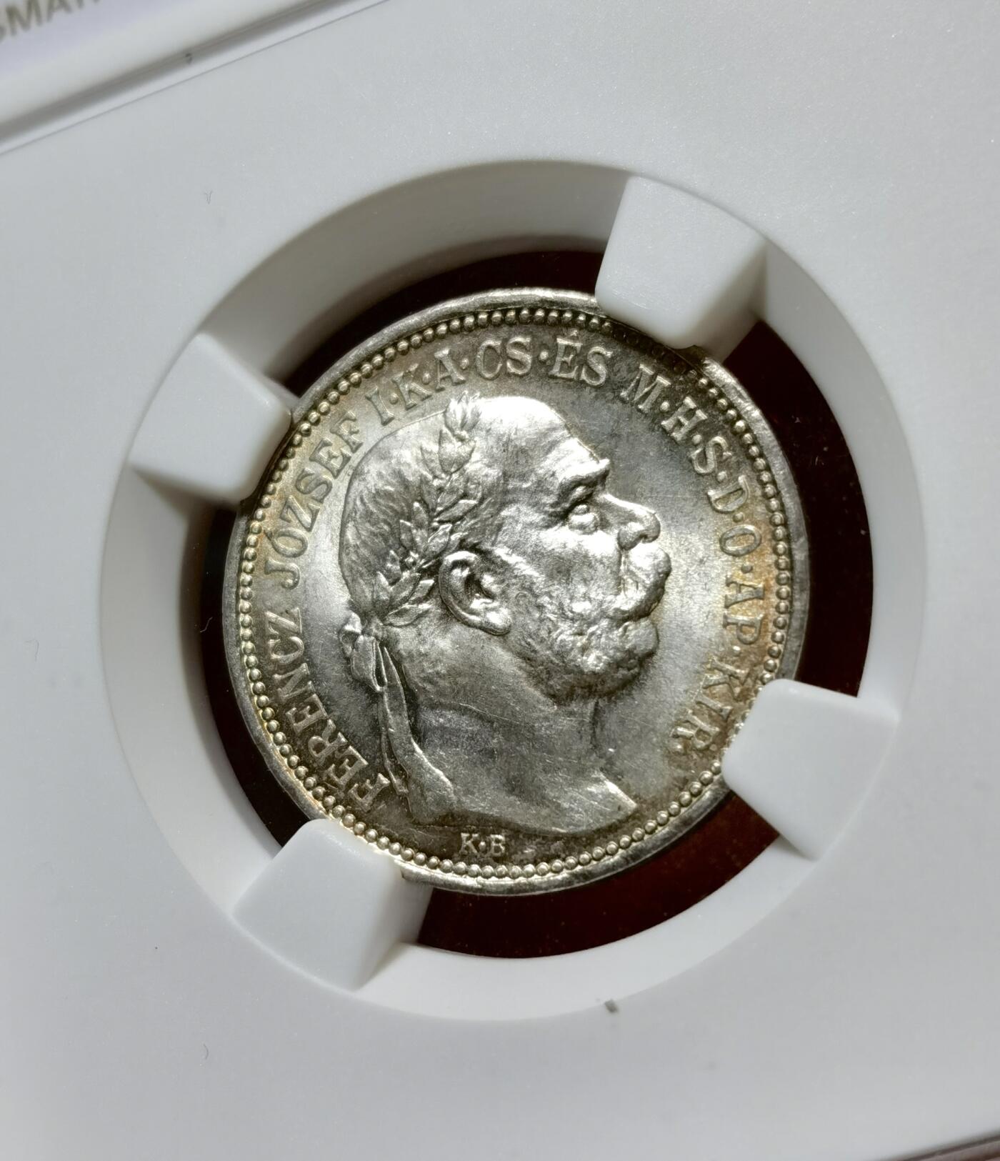 甄臻铺-世界币章拍卖（第40期）送拍享返佣金等优惠多多 NGC-MS63 奥匈帝国1915科罗娜银币，很少见的匈牙利版，正面环五彩包浆，背面镜面感非常强，状态满分的一枚，略有低评