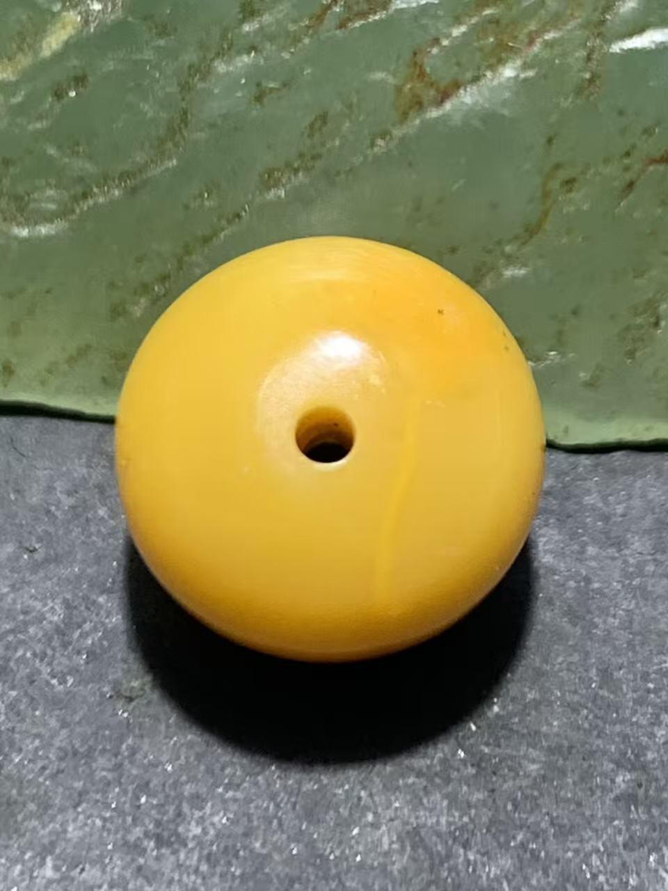 高玉化缅甸黄玉通货老形桶珠一颗！