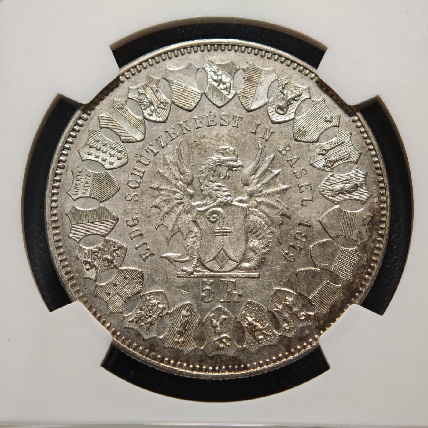 【德藏】世界币章拍卖第155期（拍品征集中~欢迎藏友联系） 1879年 瑞士巴塞尔射击节5法郎纪念银币 NGC AU 正面是手持长剑的士兵形象 背面是瑞士联邦徽章和鹰头图案 铸造精美 淡淡包浆 品相完好