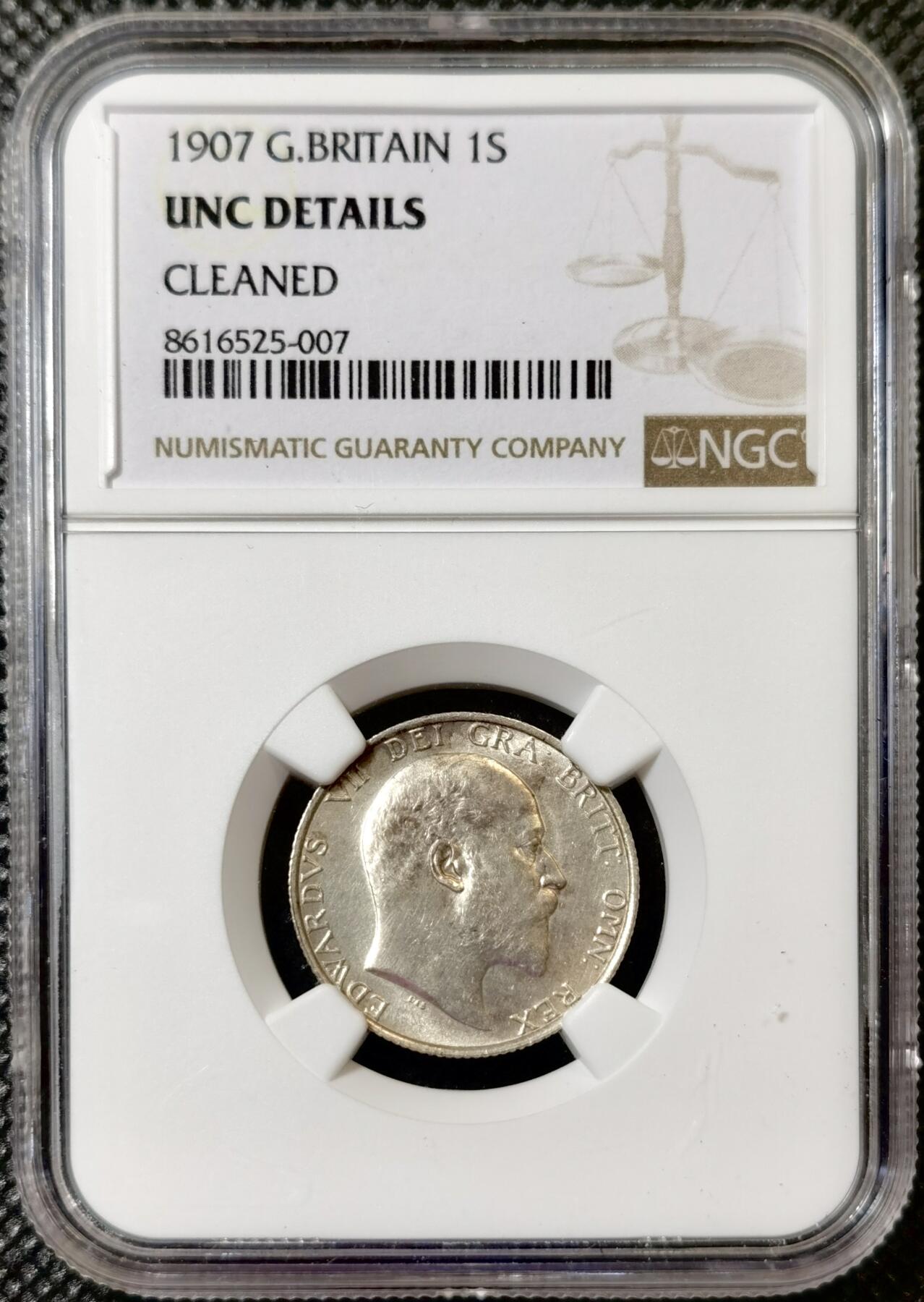 甄臻铺-世界币章拍卖（第40期）送拍享返佣金等优惠多多 NGC-UNCD 英国1907年爱德华七世站狮1先令银币 错杀状态 63分的转光