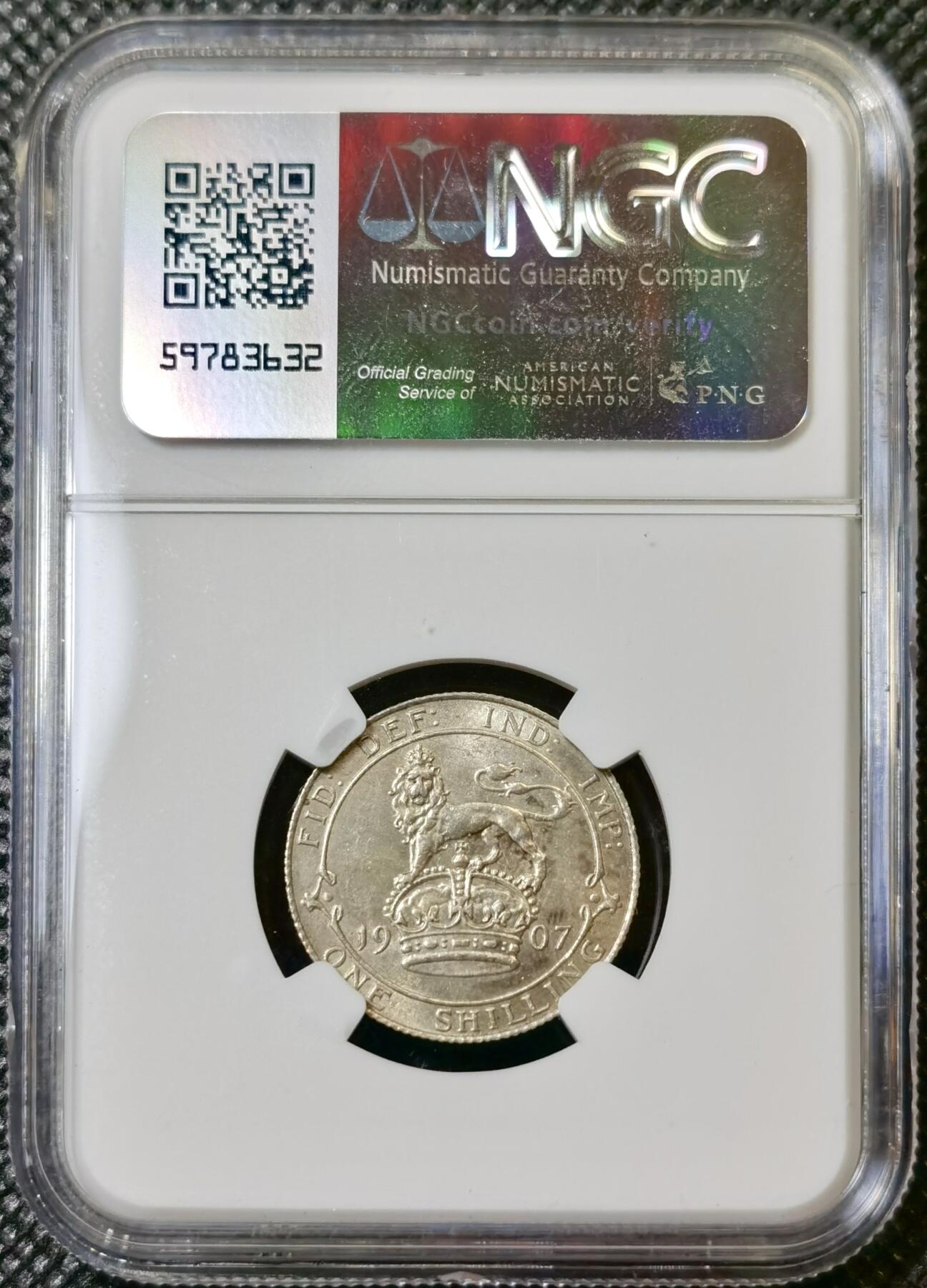 甄臻铺-世界币章拍卖（第40期）送拍享返佣金等优惠多多 NGC-UNCD 英国1907年爱德华七世站狮1先令银币 错杀状态 63分的转光