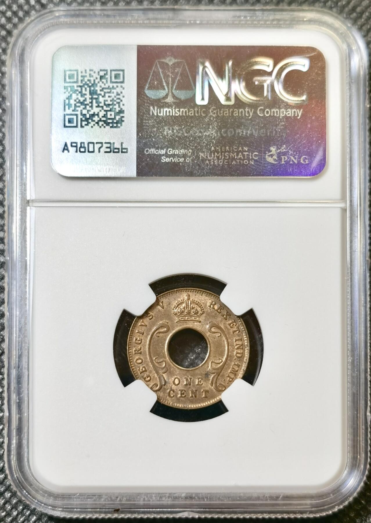 甄臻铺-世界币章拍卖（第40期）送拍享返佣金等优惠多多 NGC-MS63BN 英属东非中孔一分，有趣的中孔币，铜光满溢，状态非常好，经典殖民地品种