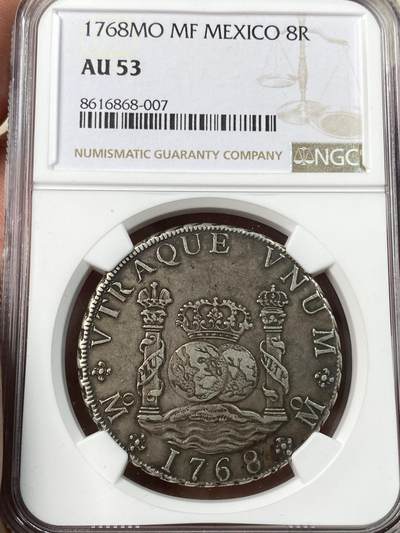 万国钱币拍卖第056期 - NGC AU53 1768年西属墨西哥MO MF卡洛斯三世地球双柱银币 全深打原味包浆 收藏级状态