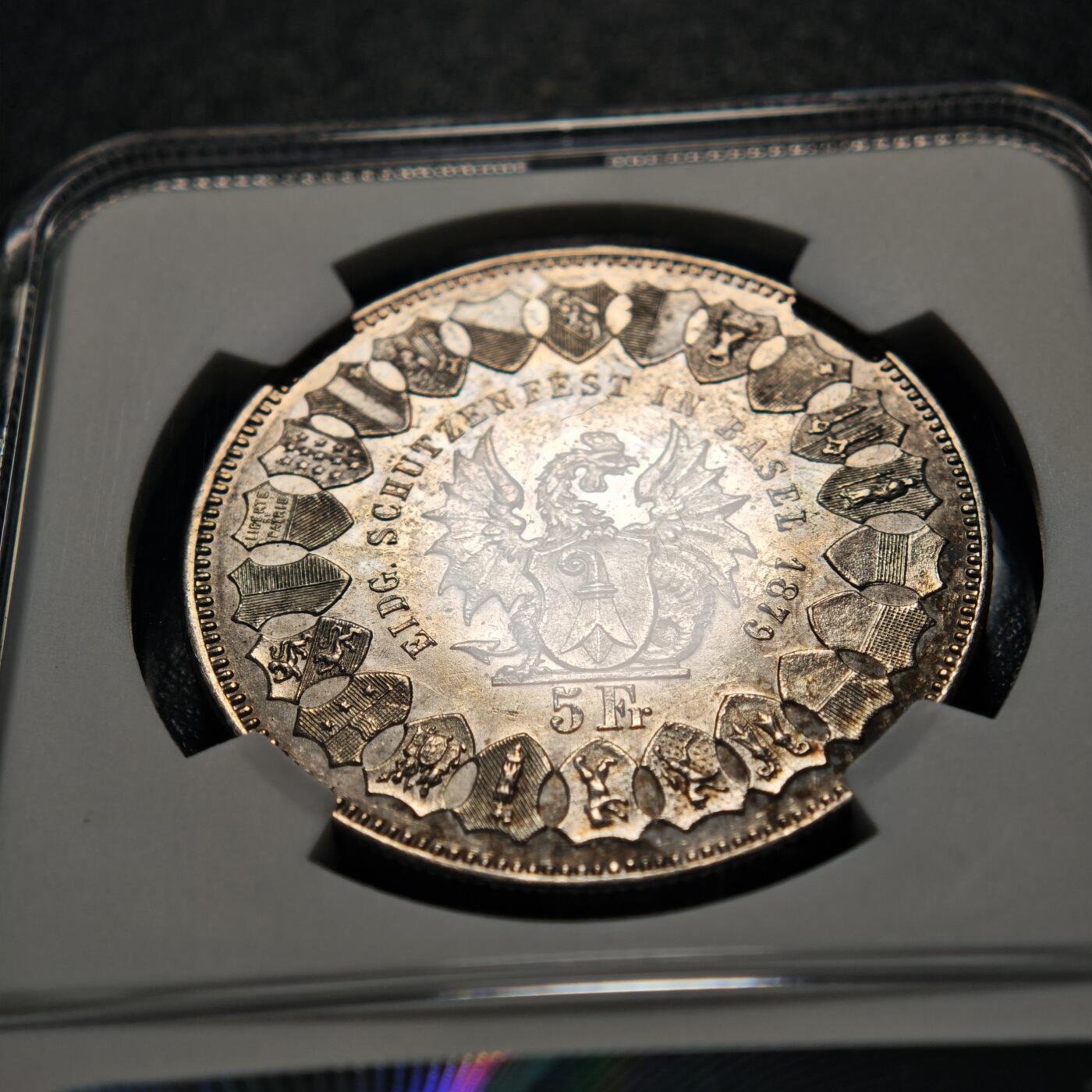 【德藏】世界币章拍卖第155期（拍品征集中~欢迎藏友联系） 1879年 瑞士巴塞尔射击节5法郎纪念银币 NGC AU 正面是手持长剑的士兵形象 背面是瑞士联邦徽章和鹰头图案 铸造精美 淡淡包浆 品相完好