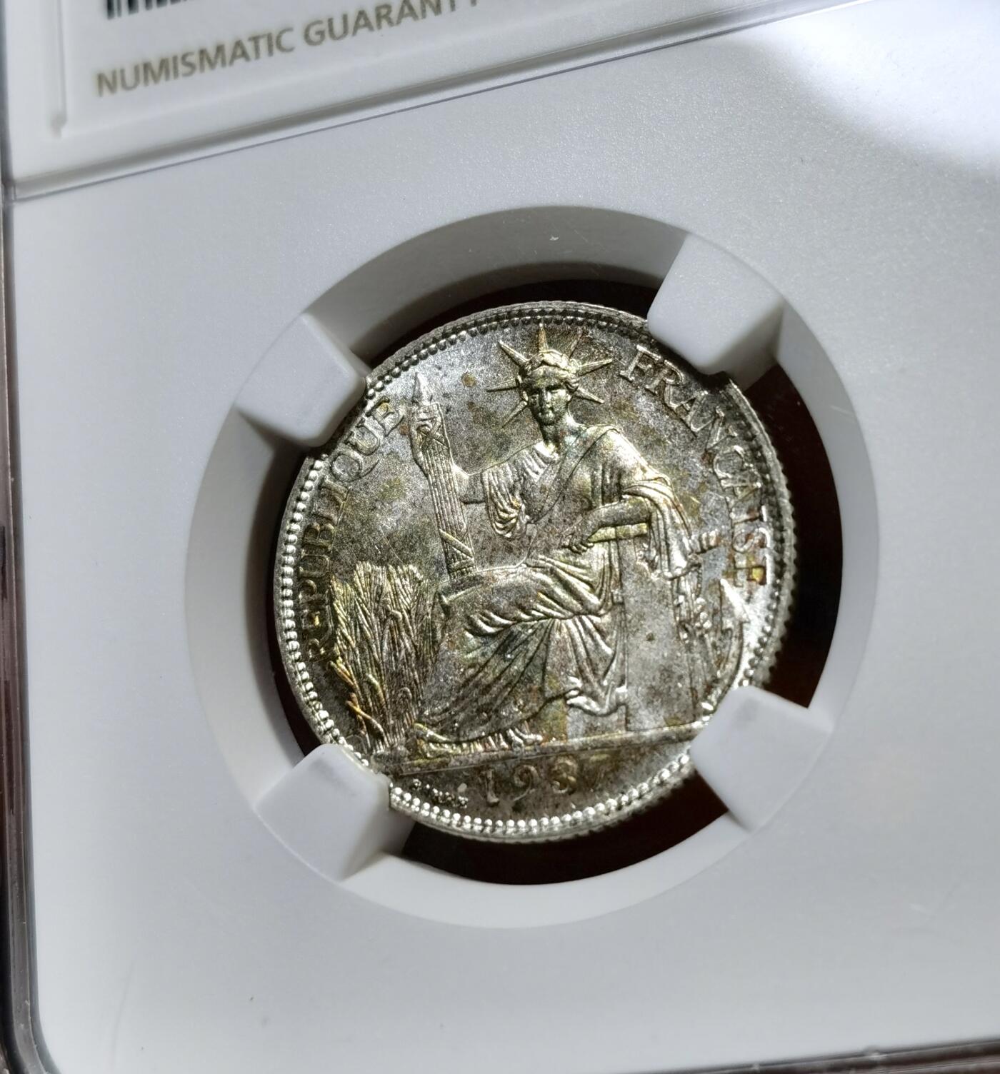 甄臻铺-世界币章拍卖（第40期）送拍享返佣金等优惠多多 NGC-MS63 1937法属印度支那20分银币，正面带彩包浆，背面原光镜面底板，状态非常好的一枚