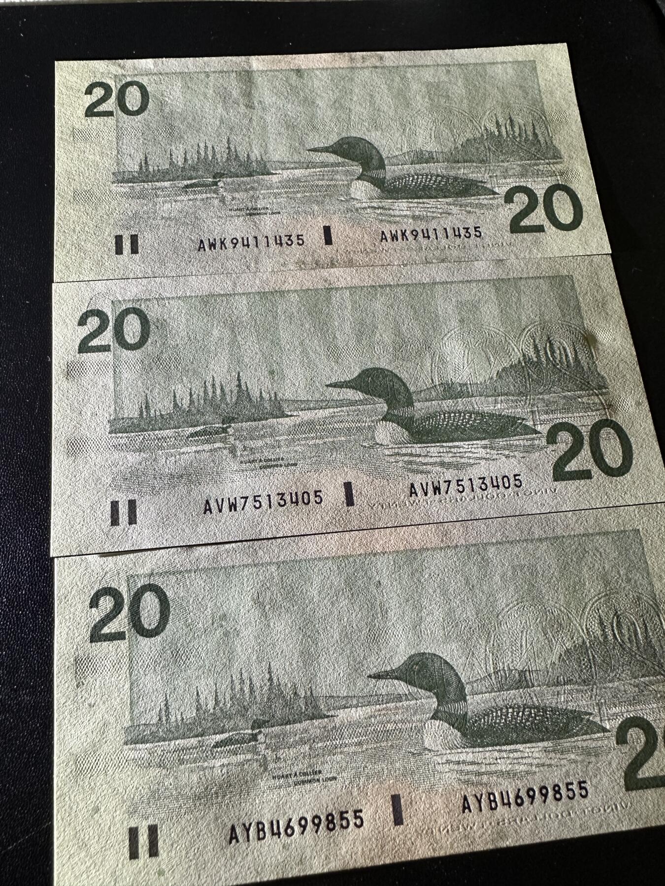 《外钞收藏家》第五百八十八期（优质场）（本平台长期征集拍品、欢迎藏友们联系合作） 加拿大1991年鸟版20元三张一组（3种不同签名；两张绝品一张UNC，尾号5相同）	UNC+绝品