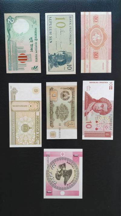 已退出流通的不同国家的外国钱币共16张通走  