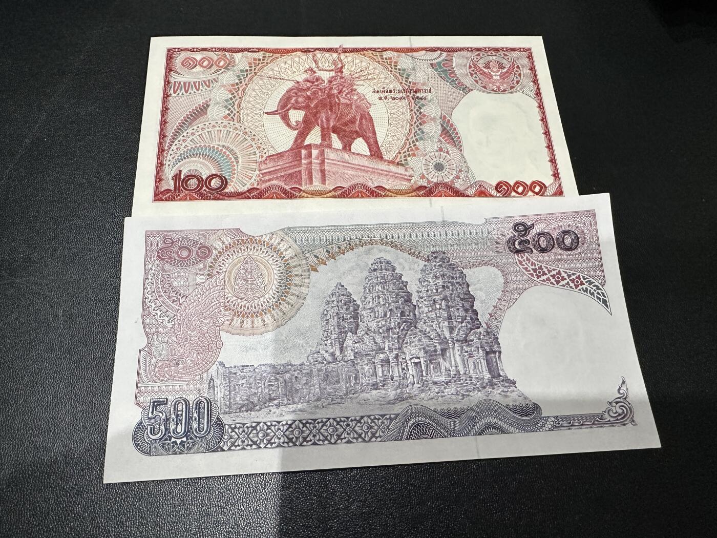 《外钞收藏家》第五百八十八期（优质场）（本平台长期征集拍品、欢迎藏友们联系合作） 泰国1978年100泰铢+1975-86年500泰铢一对	UNC 500有轻微压痕