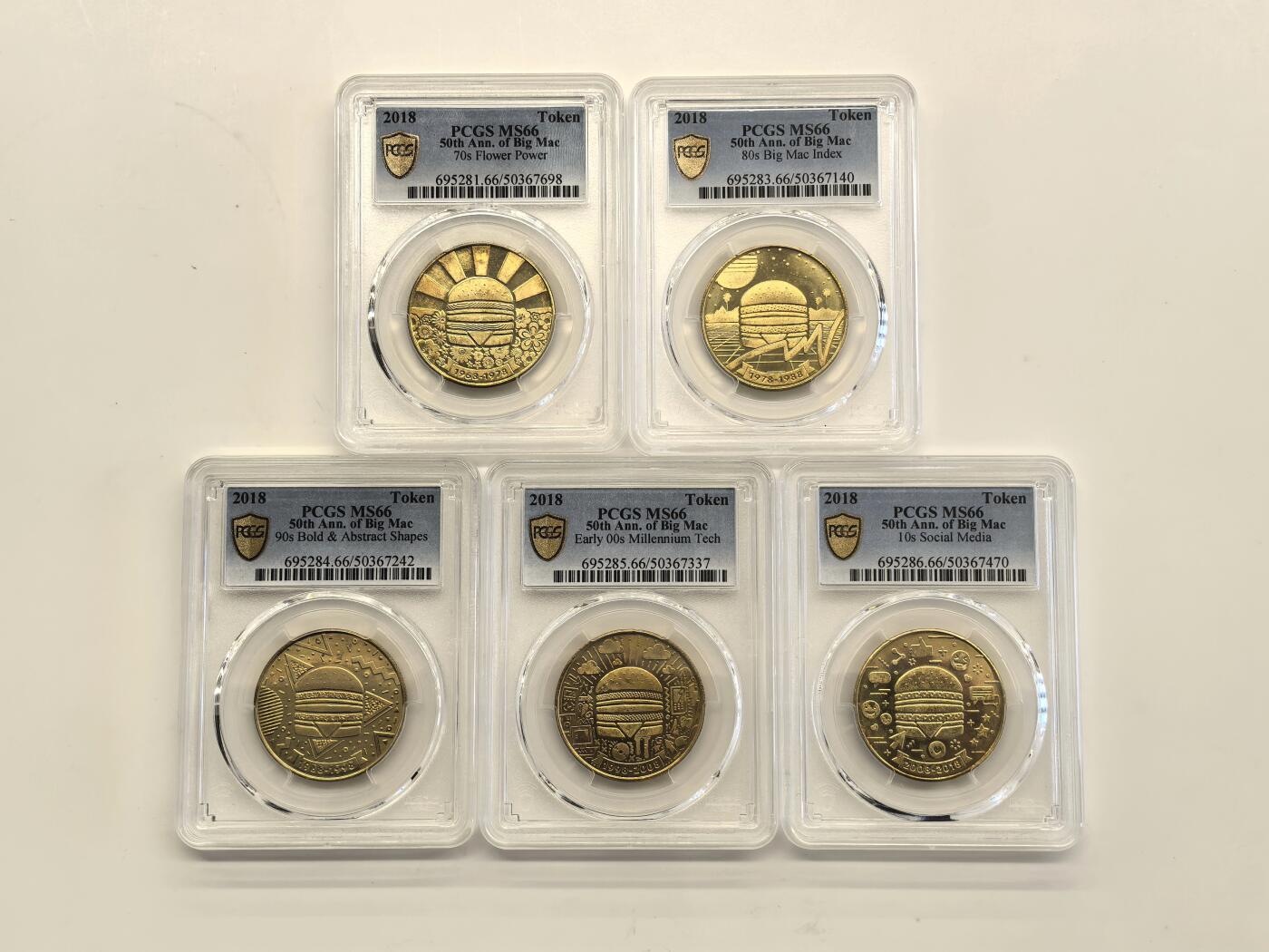 博洋堂世界钱币拍卖第149期（全场包邮） PCGS MS66 2018年麦当劳巨无霸汉堡上市50周年纪念Token全套5枚，全套评级高分非常少见，有二枚背面卡槽有磕损