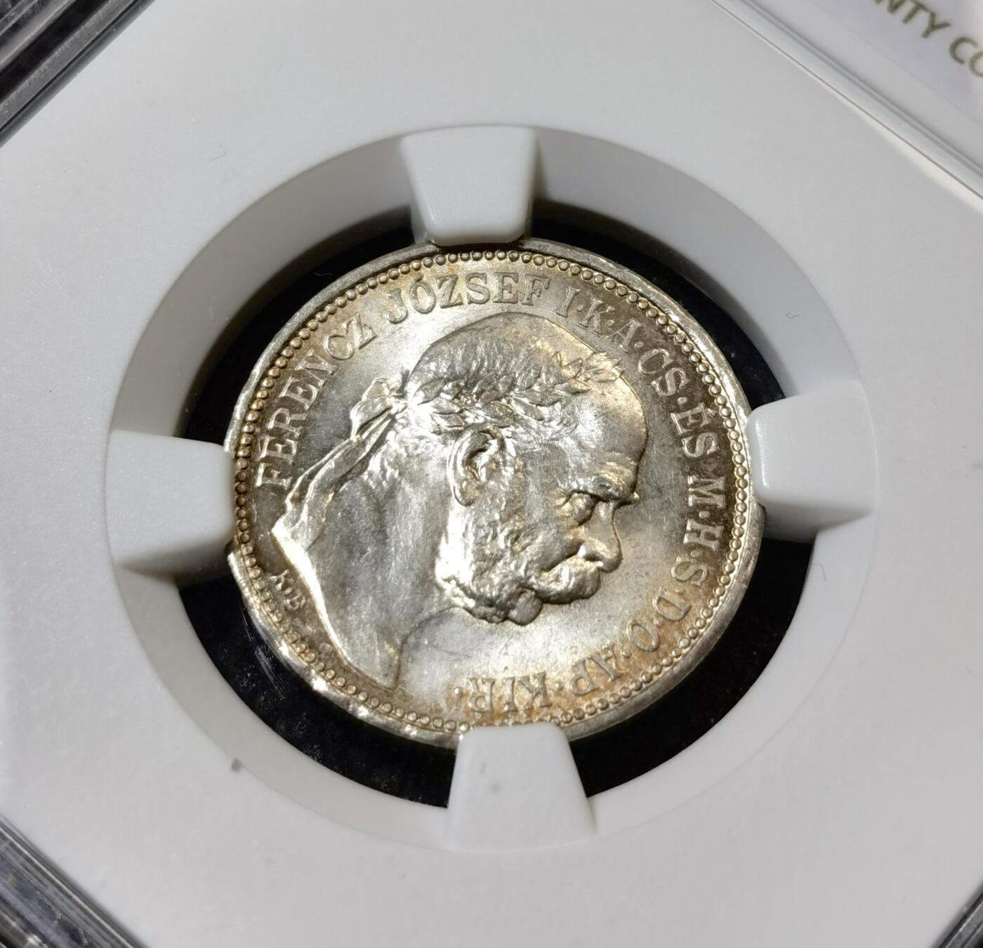 甄臻铺-世界币章拍卖（第40期）送拍享返佣金等优惠多多 NGC-MS63 奥匈帝国1915科罗娜银币，很少见的匈牙利版，正面环五彩包浆，背面镜面感非常强，状态满分的一枚，略有低评