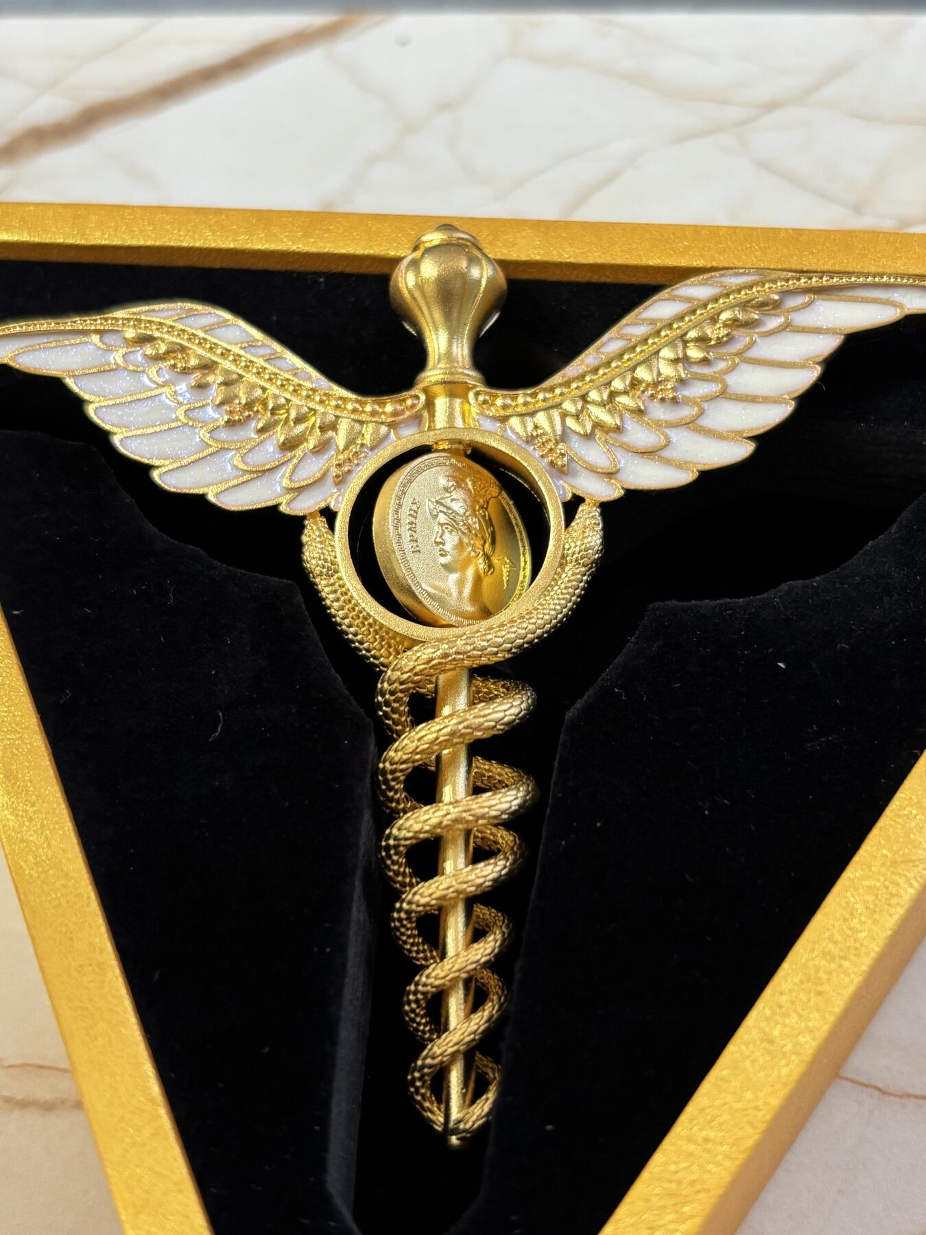 第183期拍卖 萨摩亚2025年墨丘利双蛇权杖2盎司银币中间可翻转，999银，发行699枚，2盎司