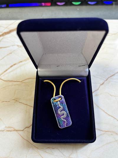 第183期拍卖 - 喀麦隆2025年中国生肖系列蛇年吊坠纪念彩色银币，999银，发行777枚，10克