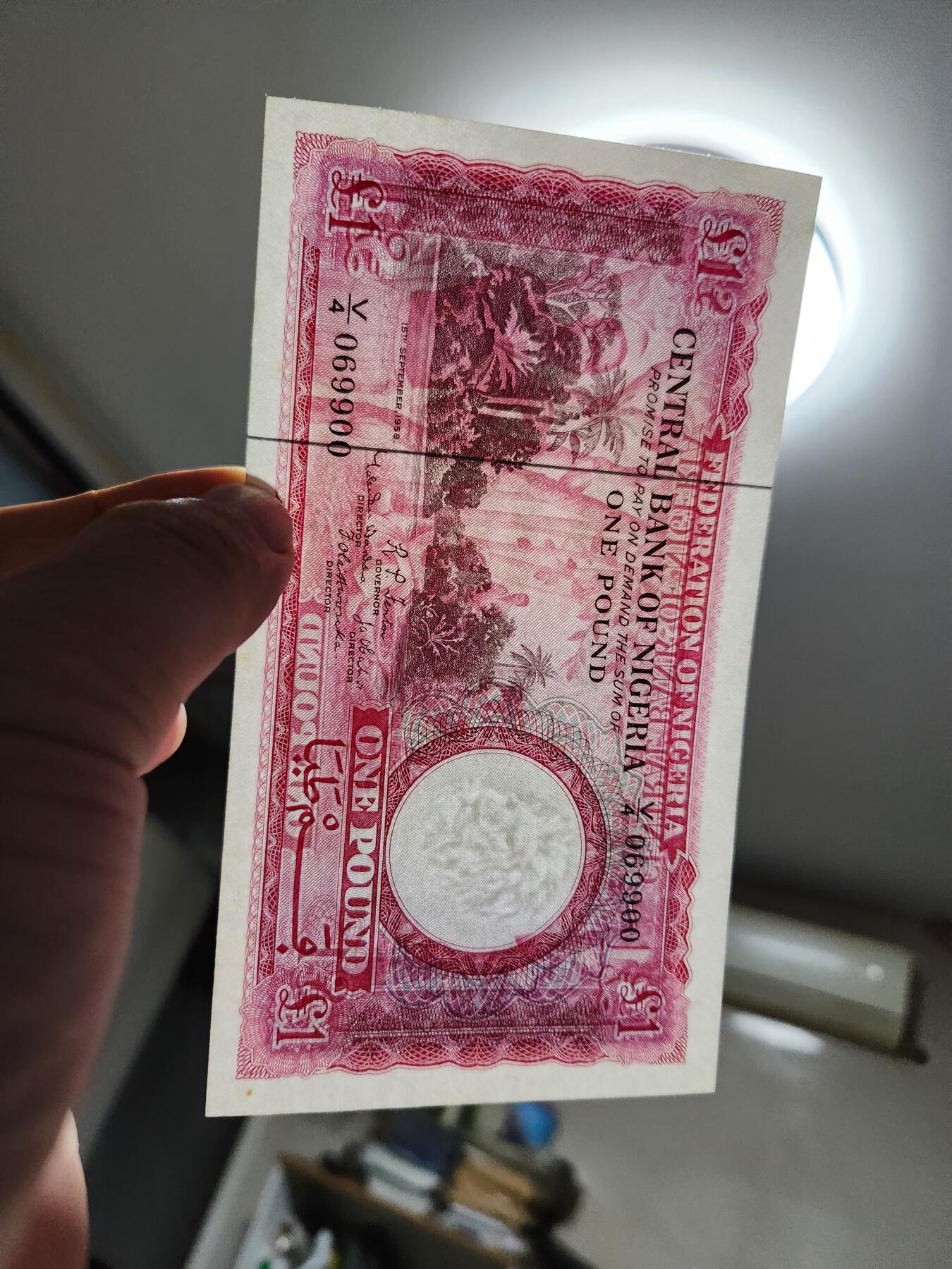 11月30号晚上8点 外国纸币自动截拍第66场 P5a 尼日利亚1958年1镑纸币 近新极美品069900好号码