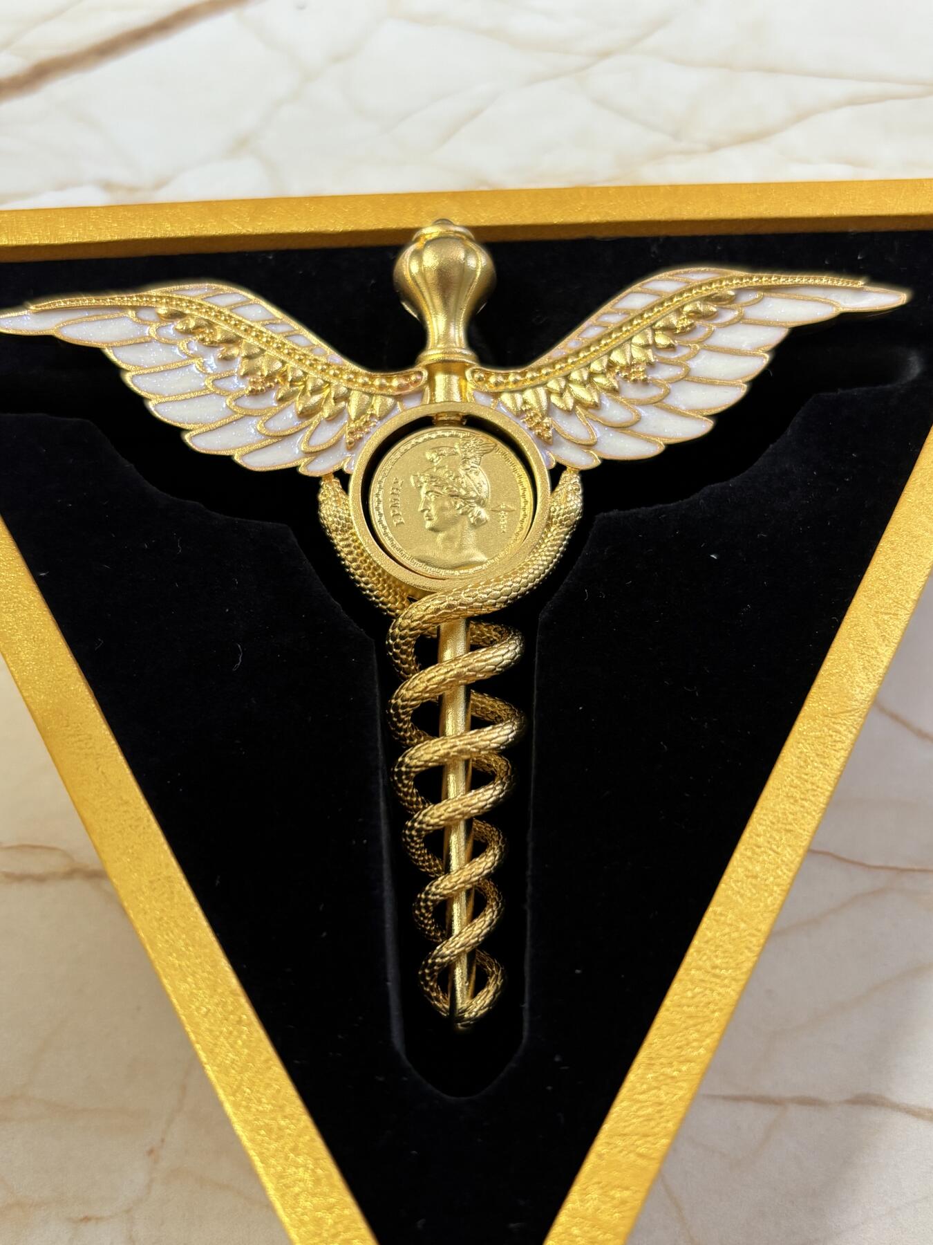 第183期拍卖 萨摩亚2025年墨丘利双蛇权杖2盎司银币中间可翻转，999银，发行699枚，2盎司