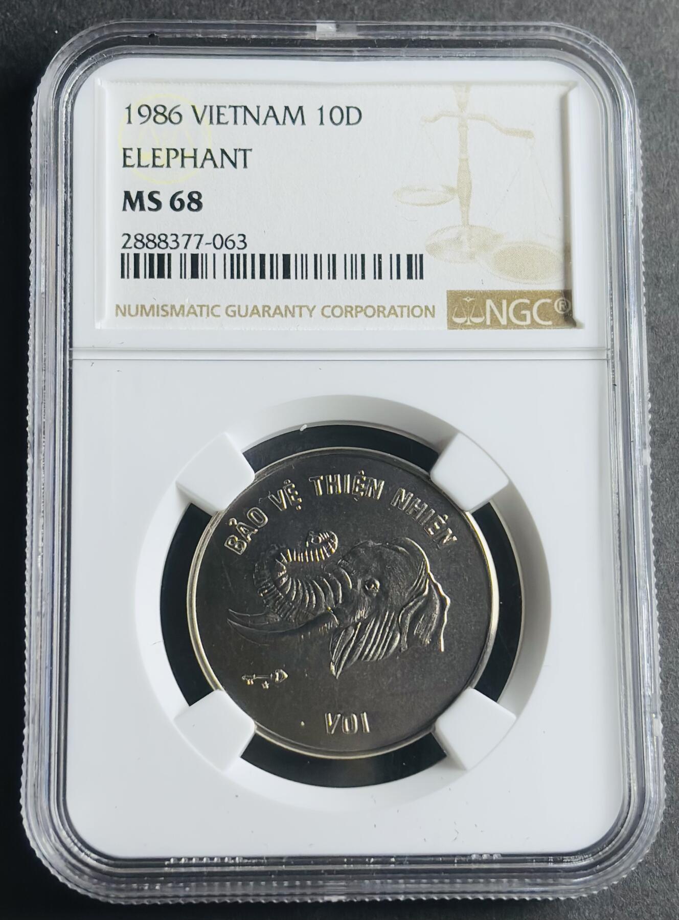 文馨钱币收藏第 283 场，【大雪鉴珍，寒英缀金】金银纪念币精品场，诚邀您的参与【长期接代拍品】 稀少 1986 年越南大象 10 盾纪念币，NGC 评级 MS68 分