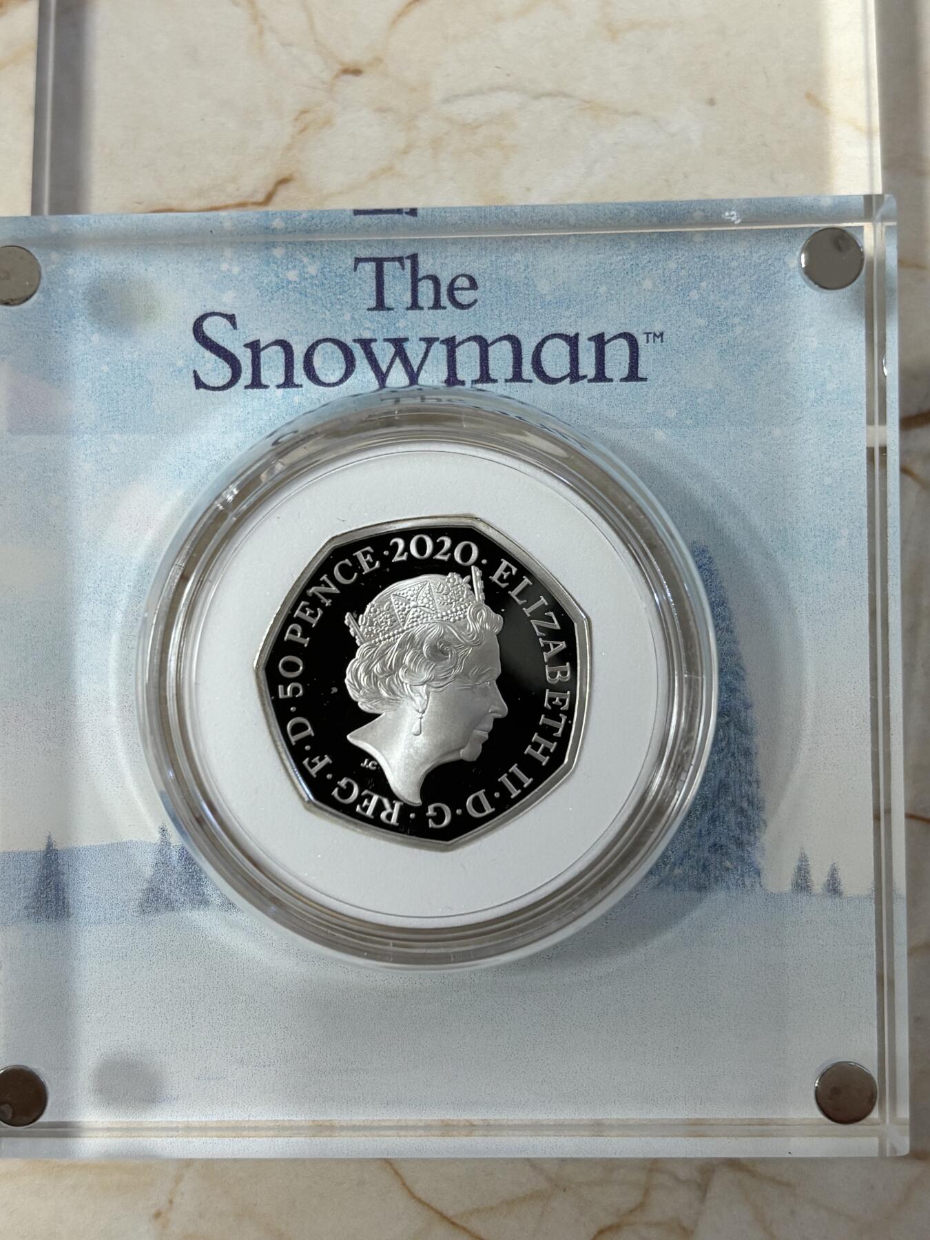 第183期拍卖 英国2020年雪人七边形彩色精制纪念银币，925银，8克，发行量7000枚