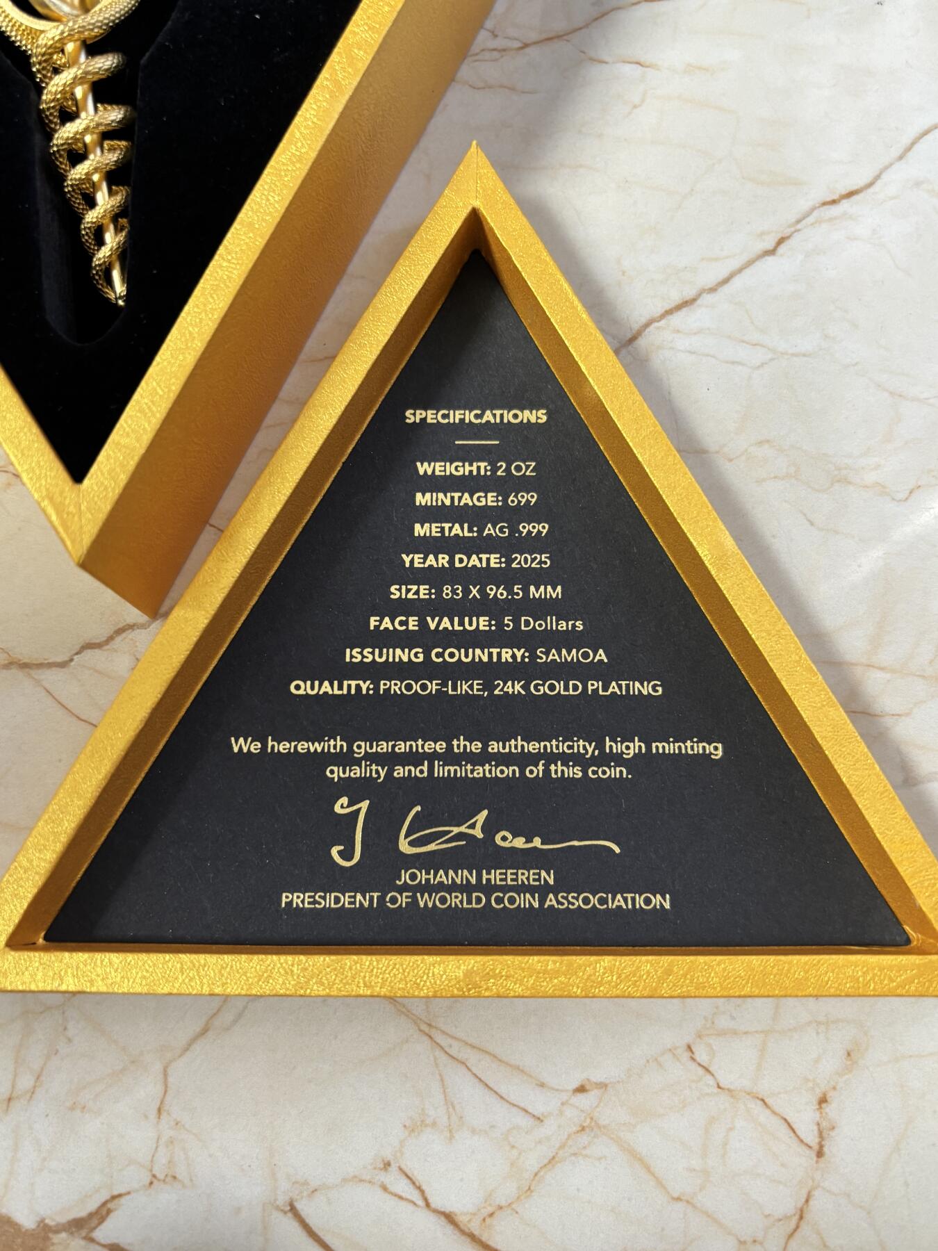 第183期拍卖 萨摩亚2025年墨丘利双蛇权杖2盎司银币中间可翻转，999银，发行699枚，2盎司