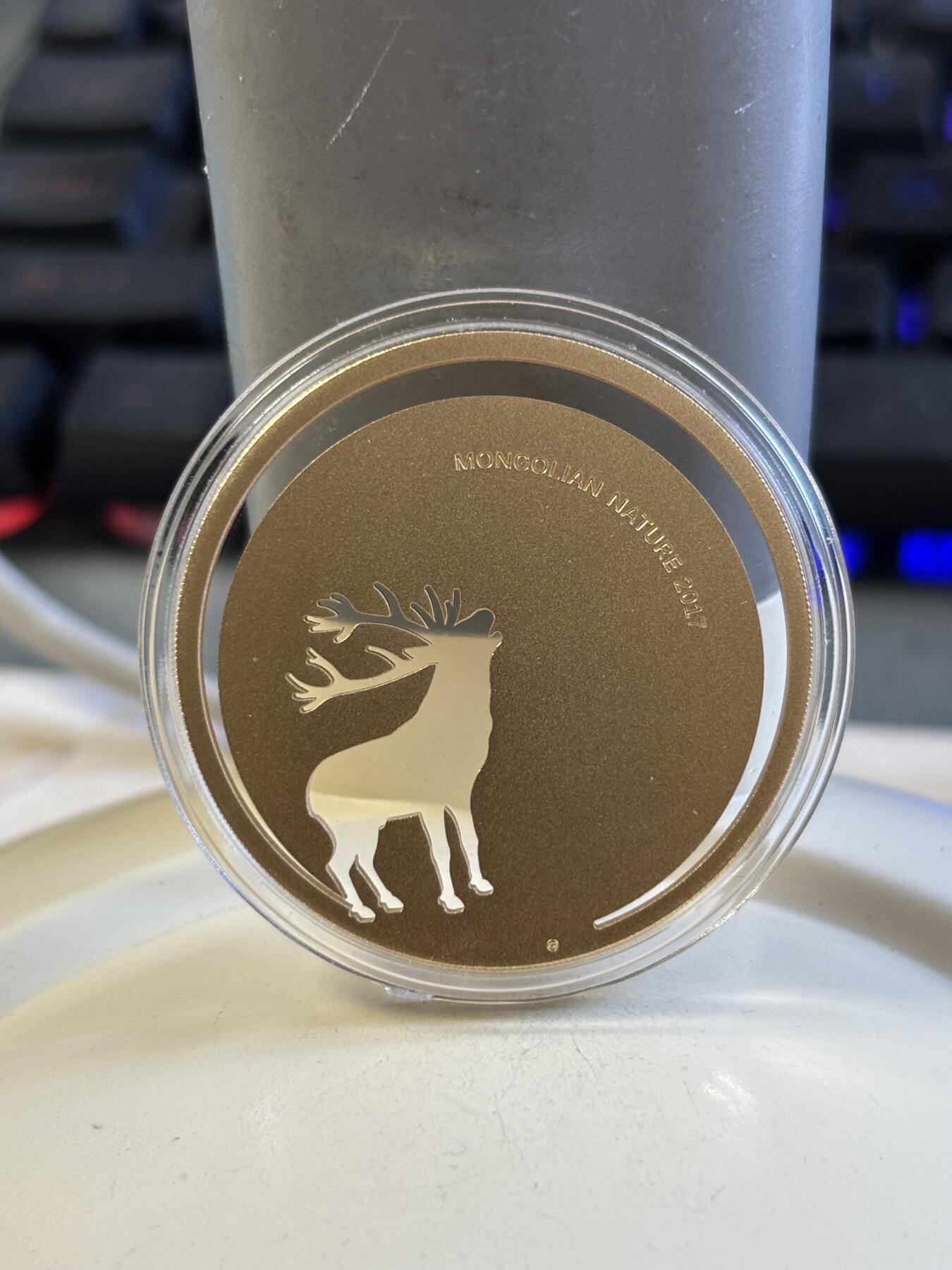 第183期拍卖 蒙古2017年自然系列雄鹿激光切割镂空镀金纪念银币，925银，发行2500枚