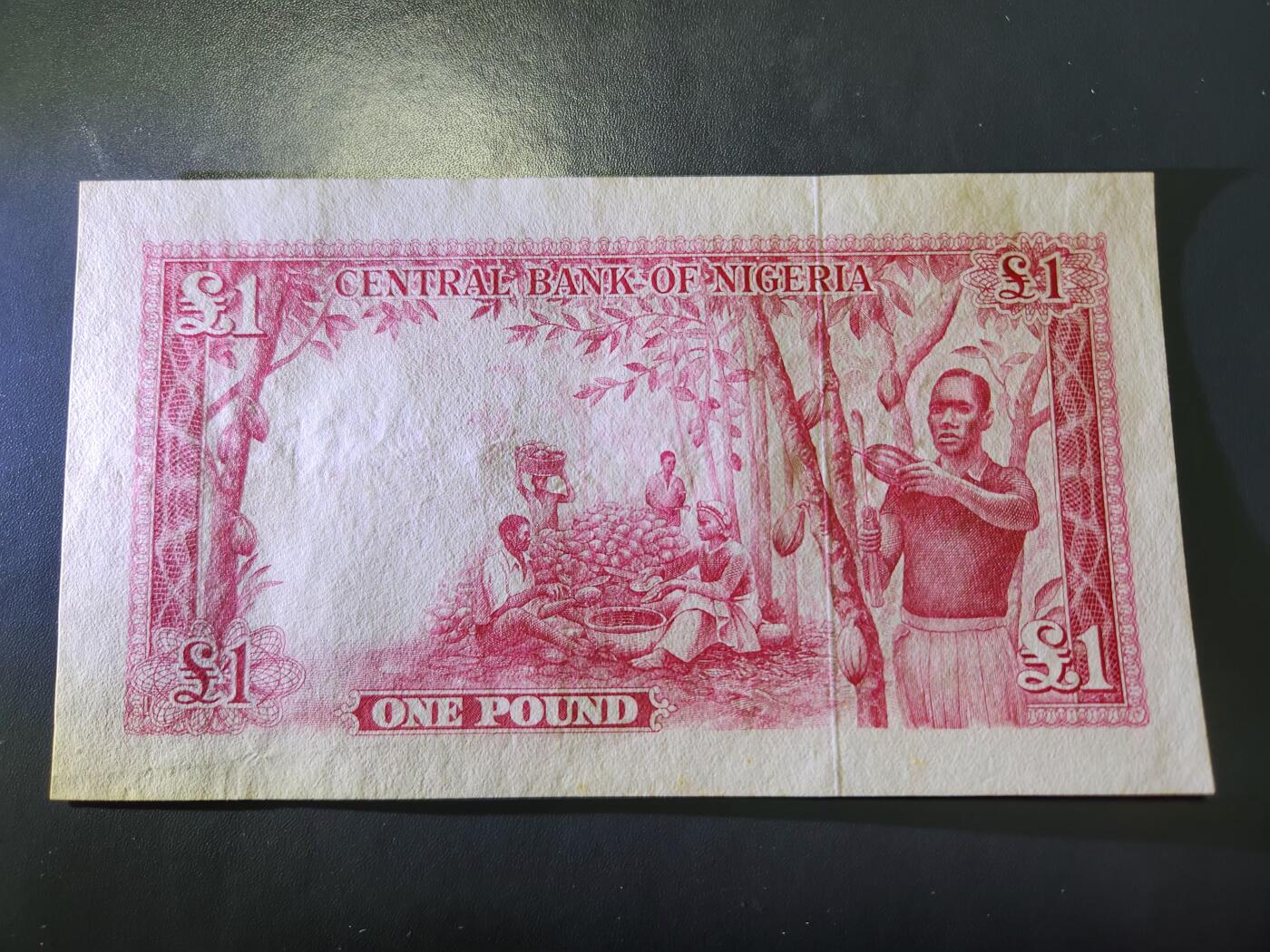 11月30号晚上8点 外国纸币自动截拍第66场 P5a 尼日利亚1958年1镑纸币 近新极美品069900好号码